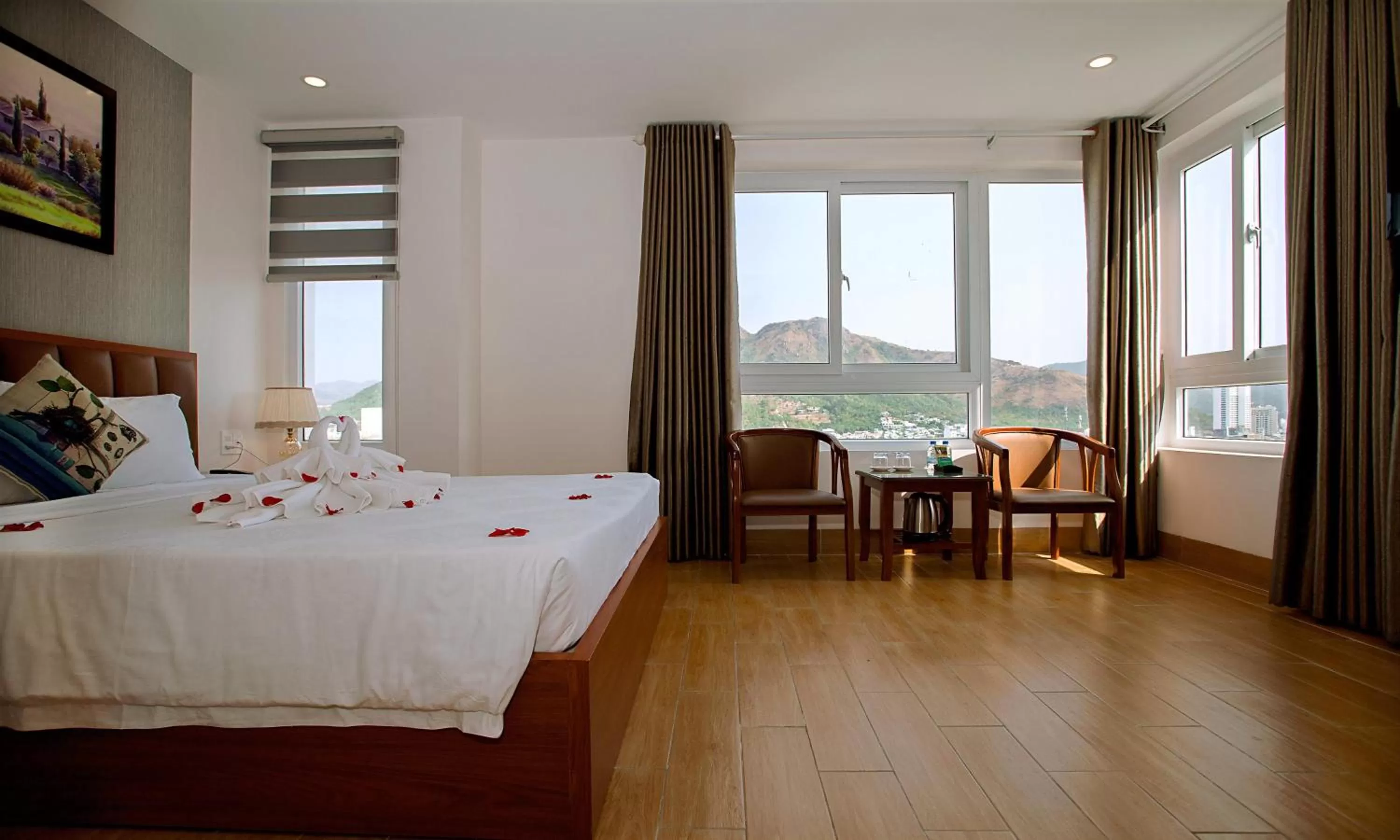 Seating area, Bed in Canary Nha Trang Hotel