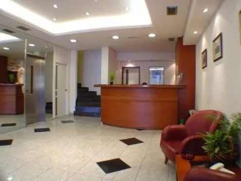 Lobby or reception in Economy Hotel