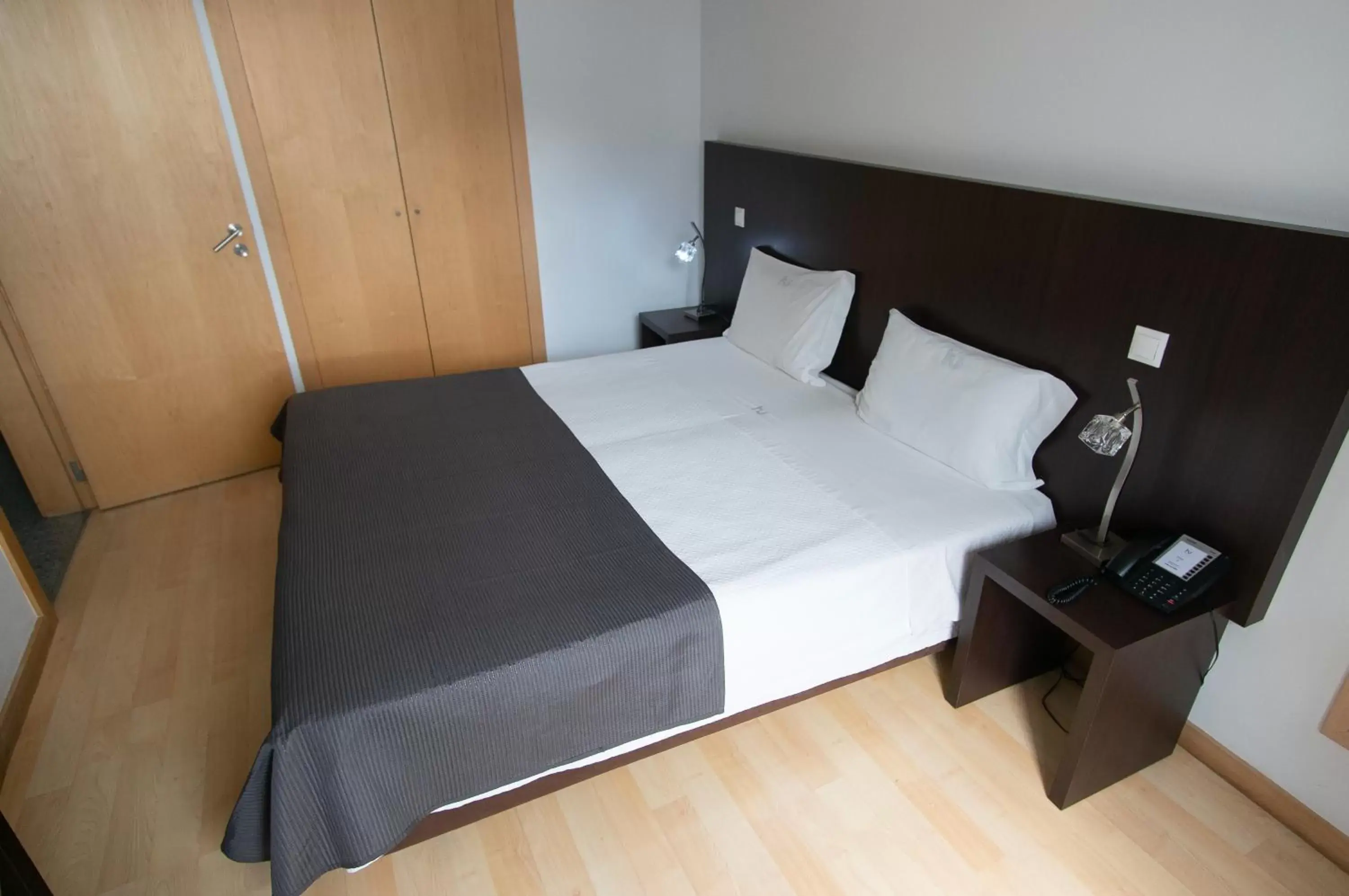 Bed in Hotel Vitória