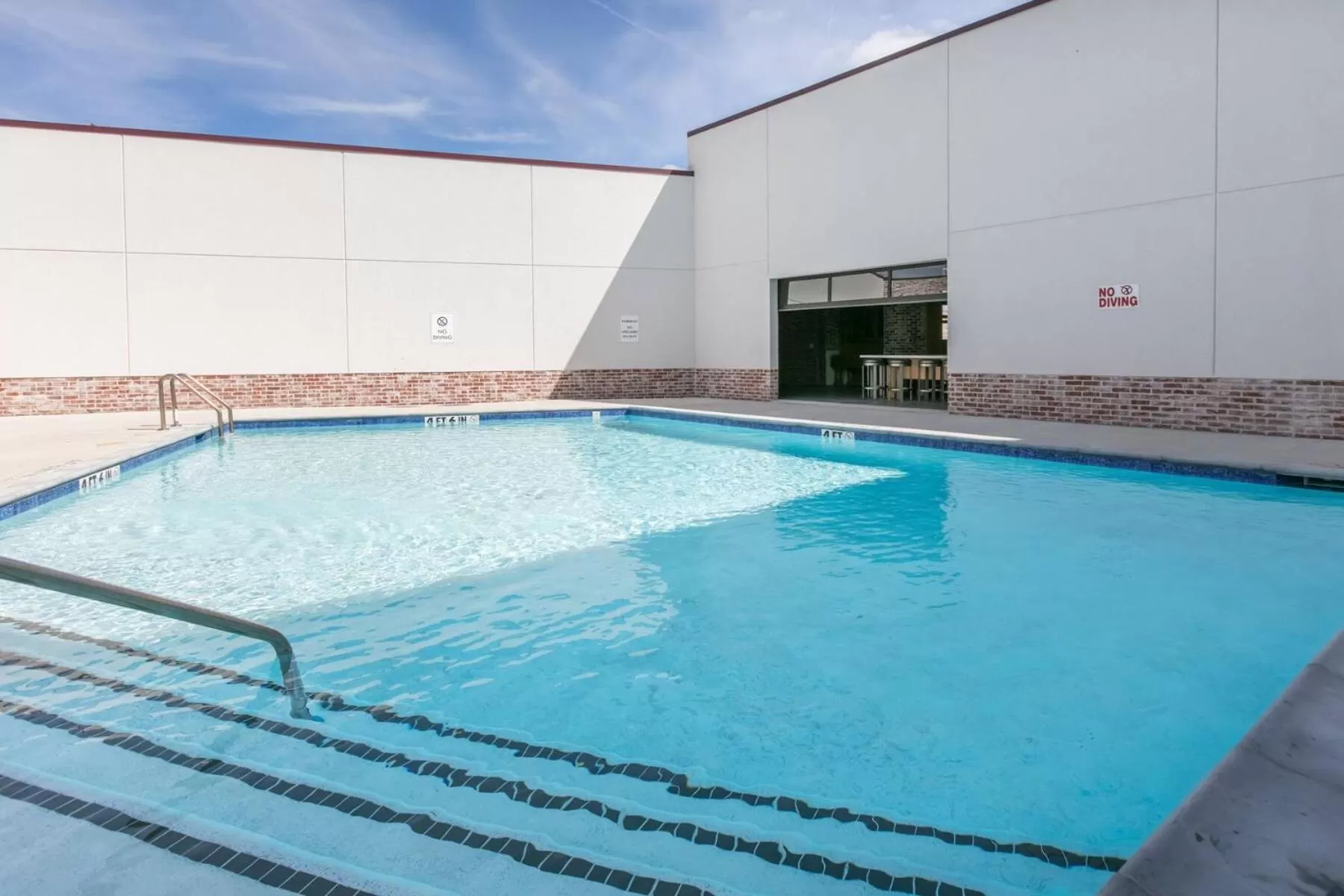 Swimming pool in voco College Station Aggieland by IHG