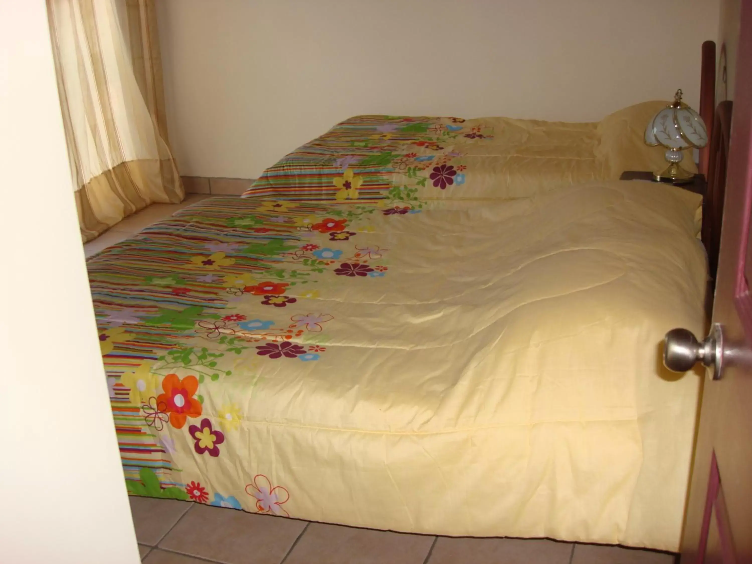 Bedroom, Bed in Hotel La Guaria Inn & Suites