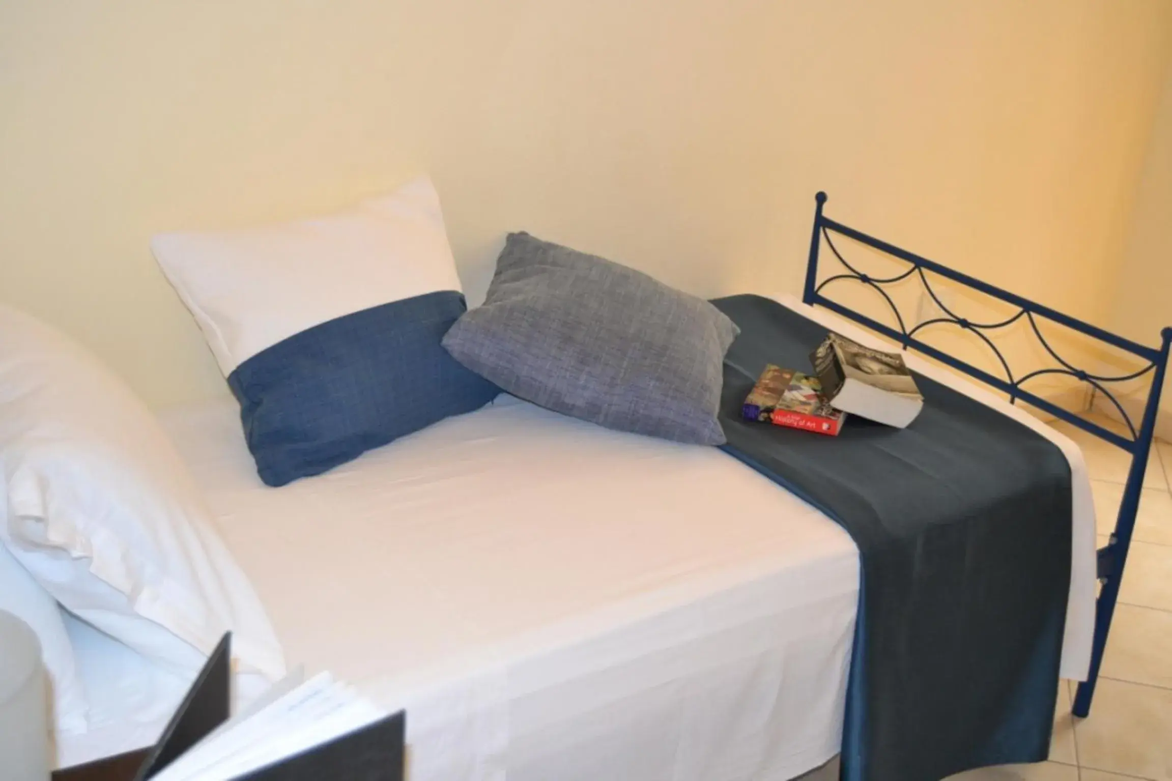 Bed in Al Pescatore Hotel & Restaurant