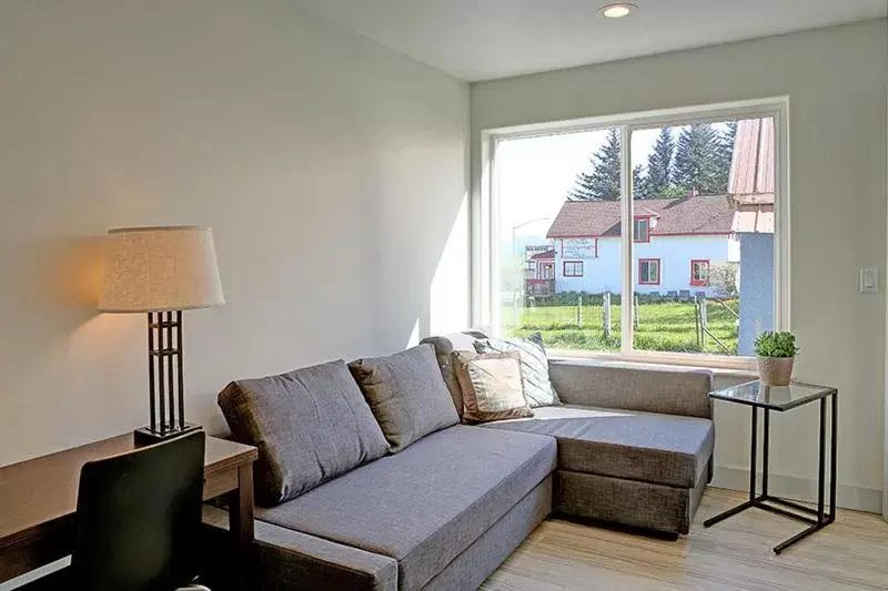 Bed, Seating Area in The Vue B&B