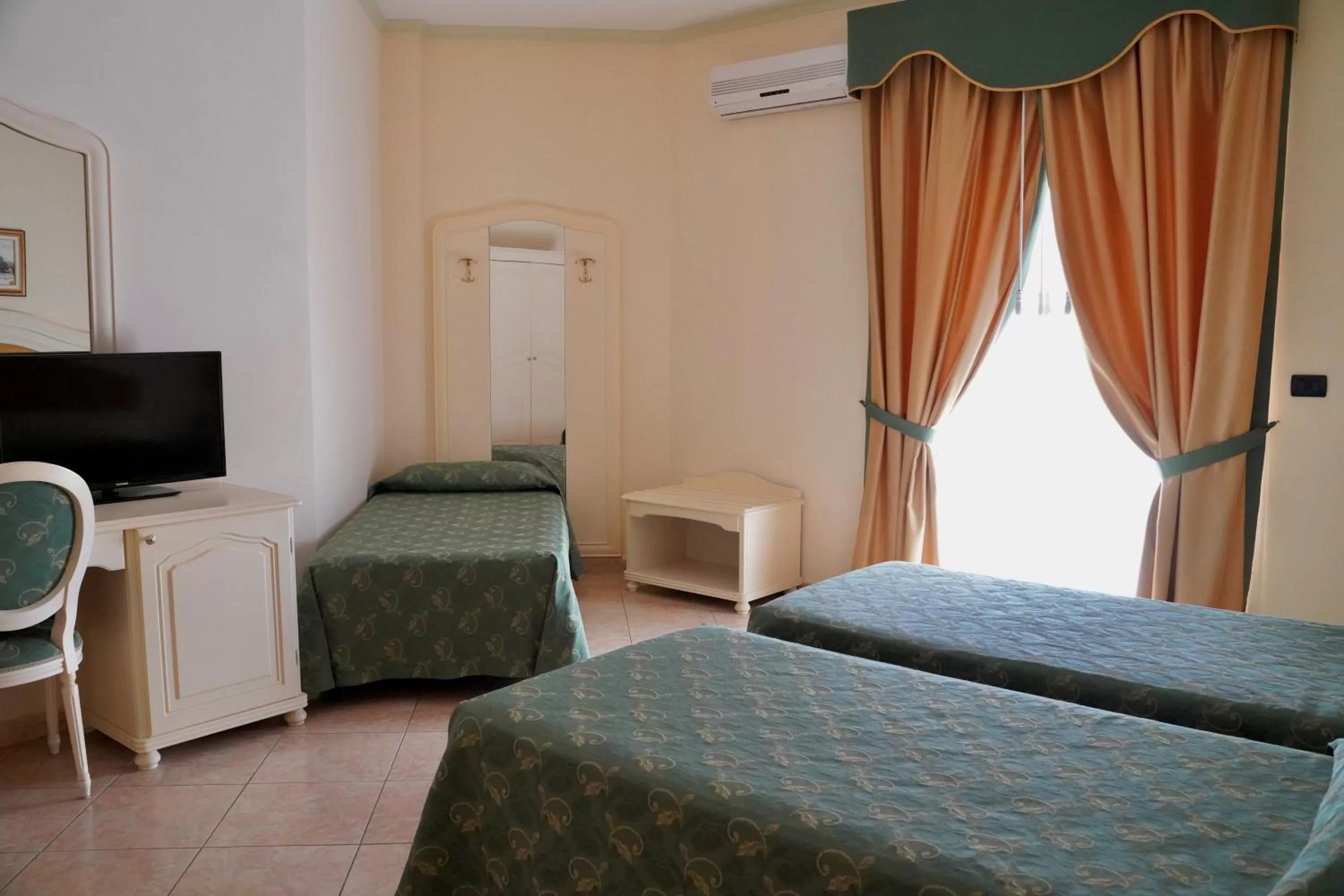 Bedroom in Hotel Roscianum Welness SPA