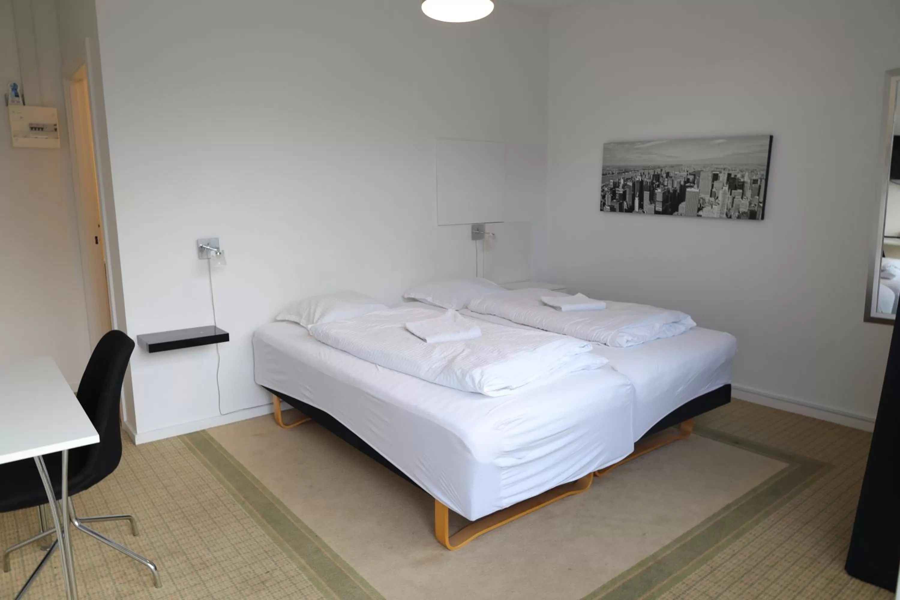 Bed in Motel Sindal