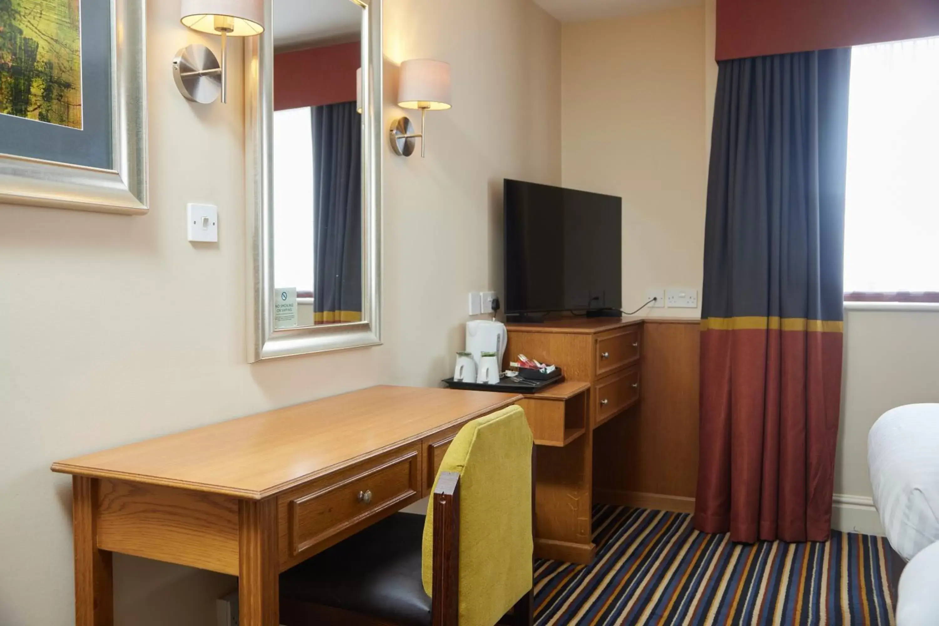 Bedroom, TV/Entertainment Center in The Broughton Hotel by Greene King Inns