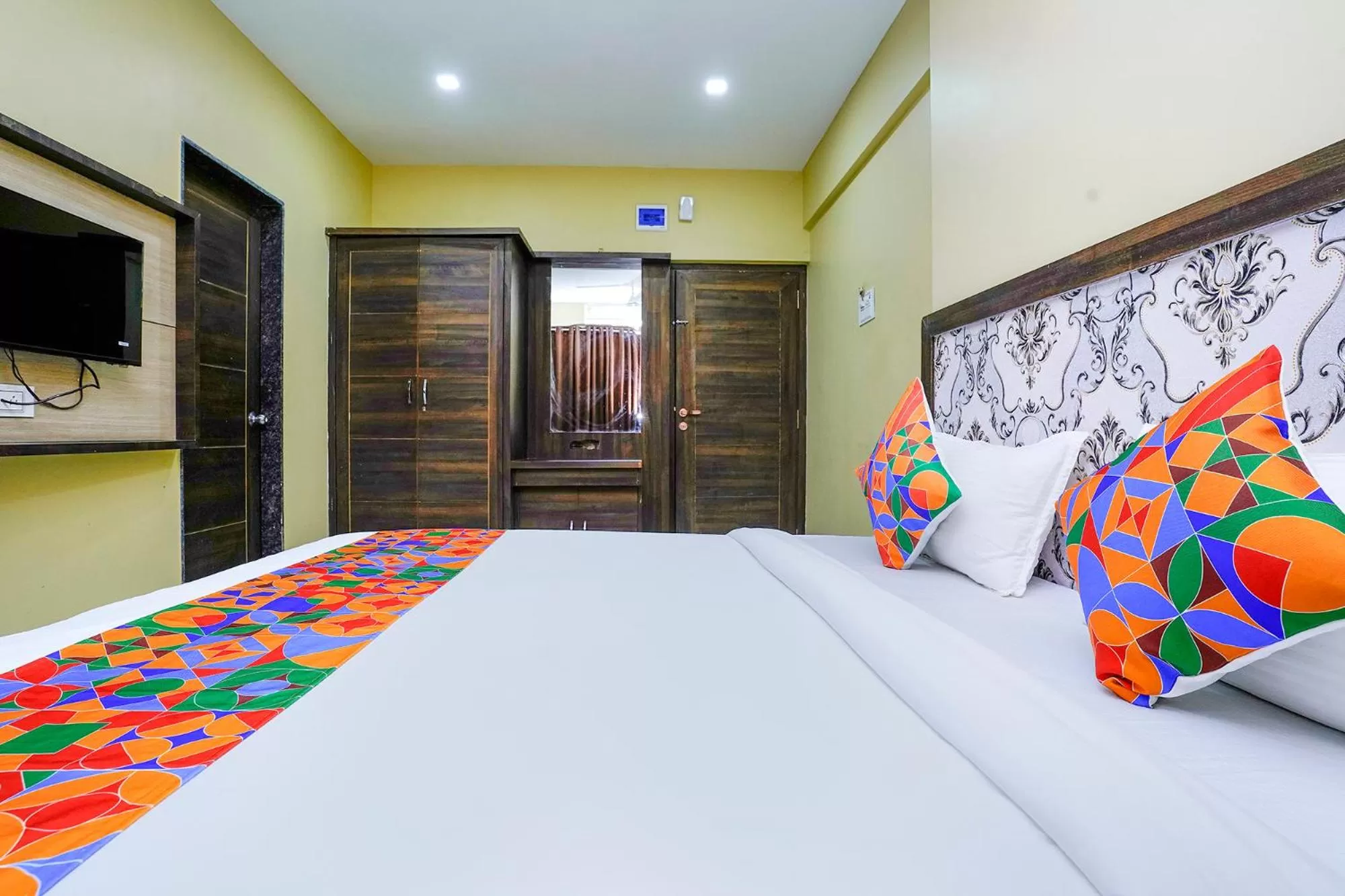 Bed in FabHotel Bhiwandi Palace