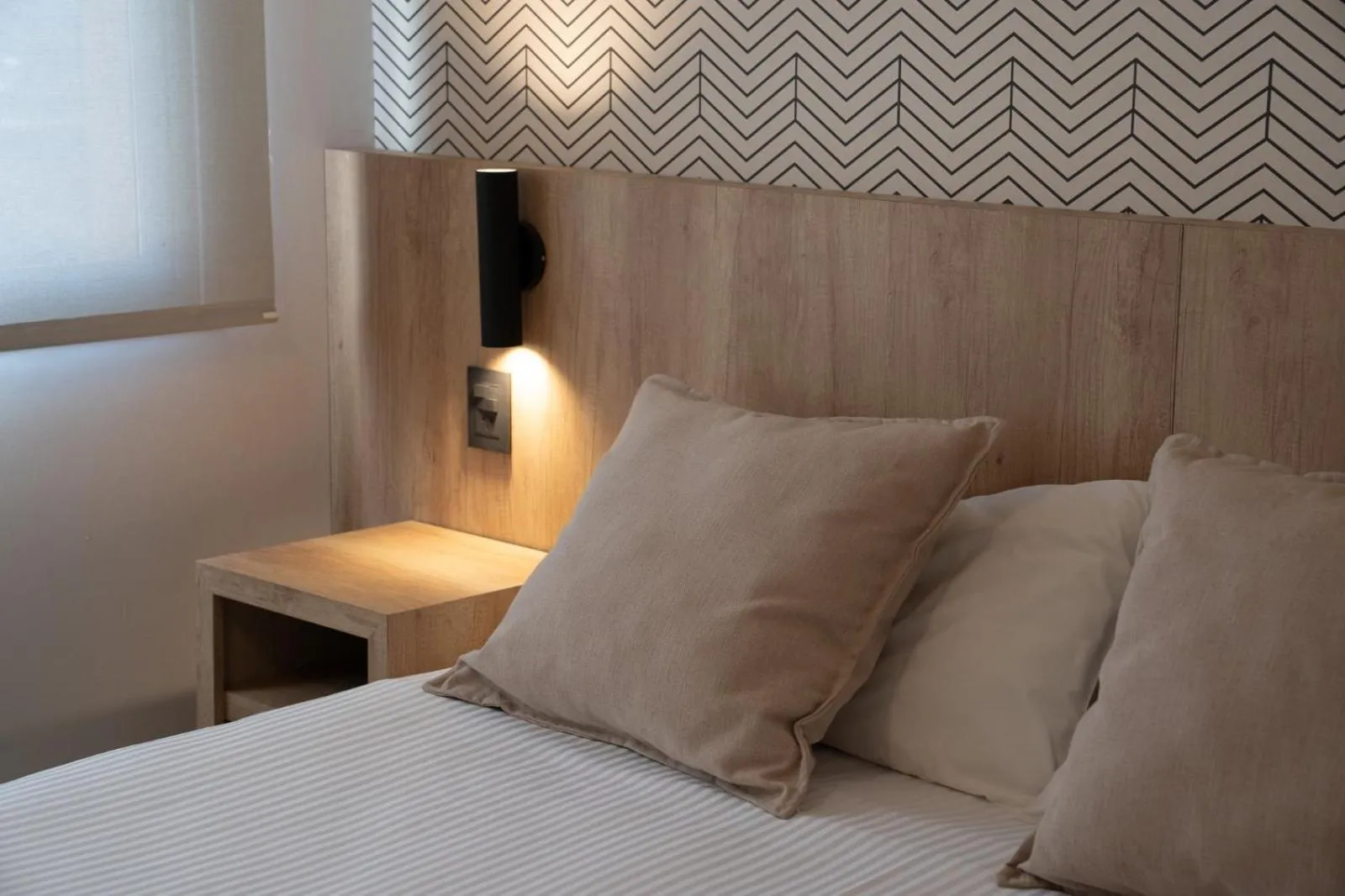 Bed in Urbana Class Hotel