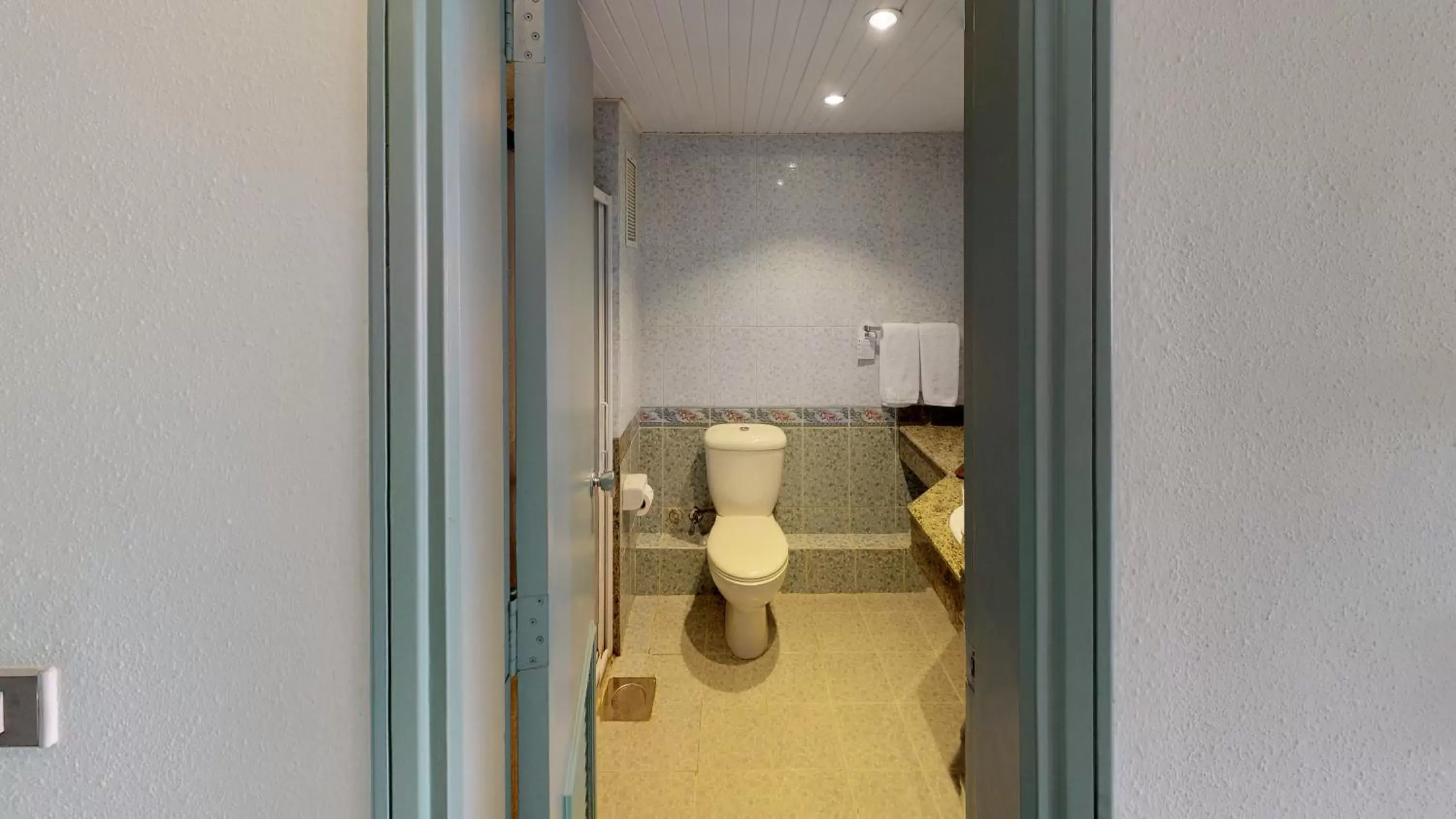 Toilet, Bathroom in Falcon Hills Hotel