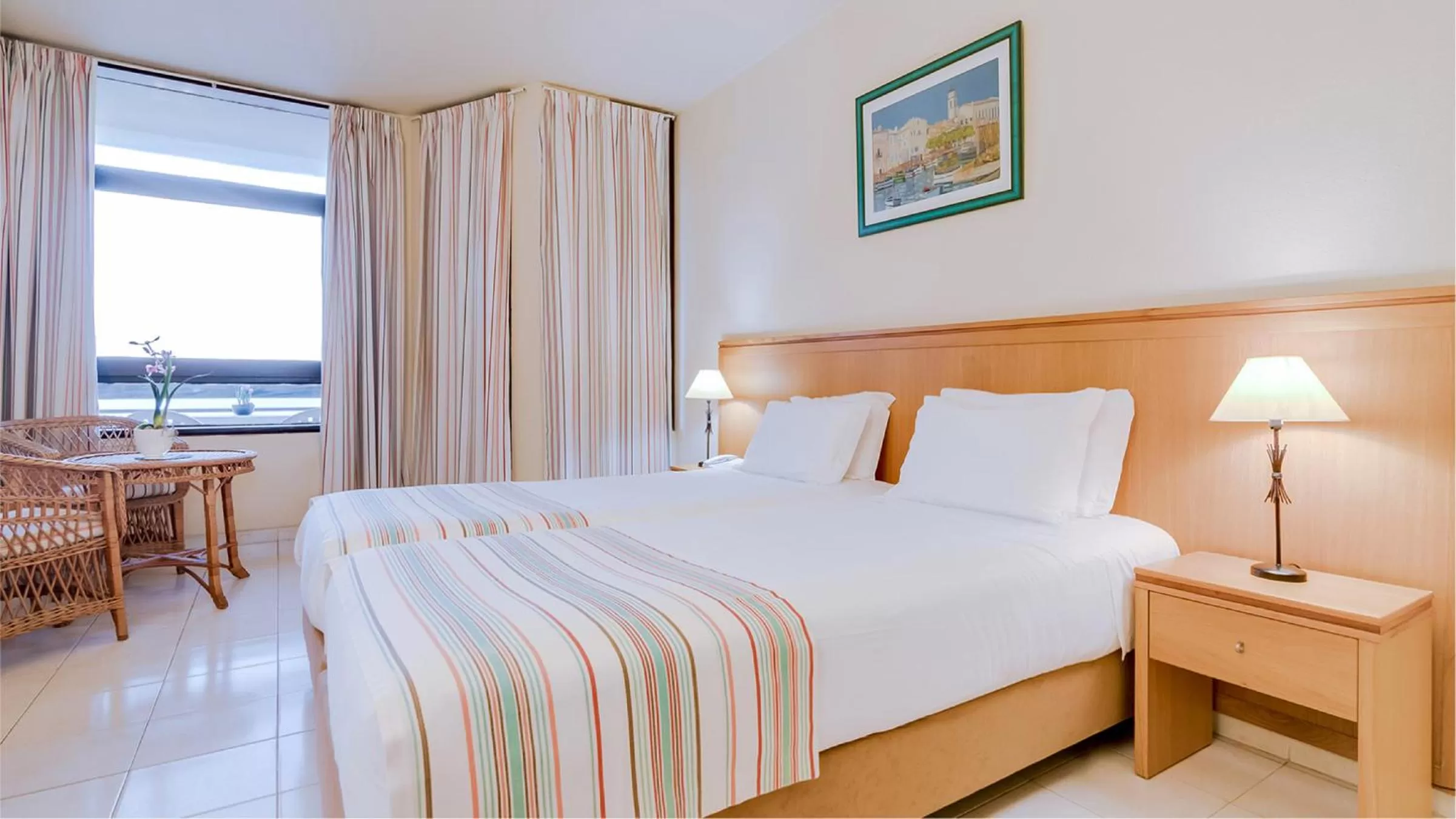 Twin Room (3 Adults + 1 Child) in Auramar Beach Resort
