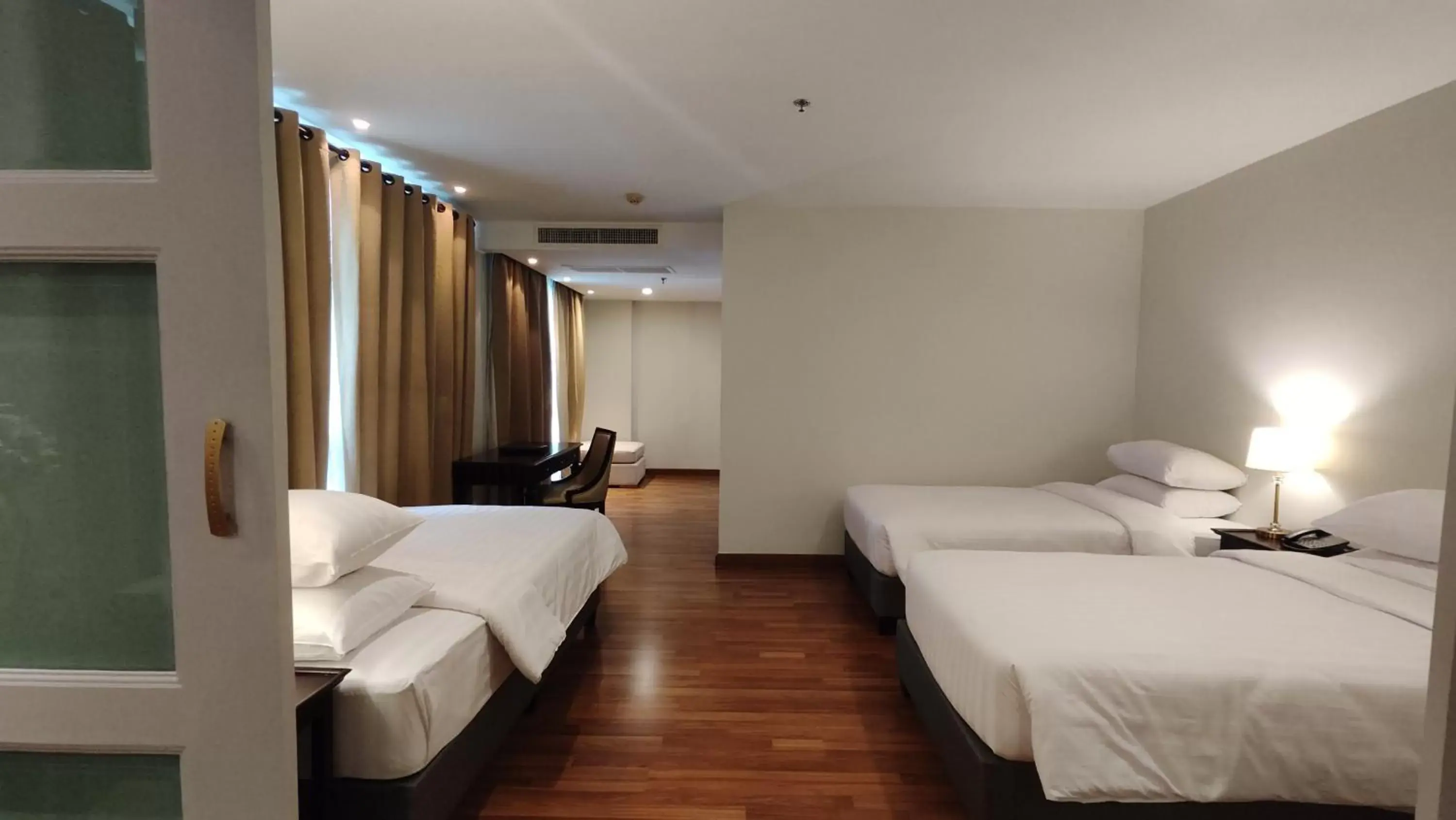 Bed in The Bless Hotel and Residence
