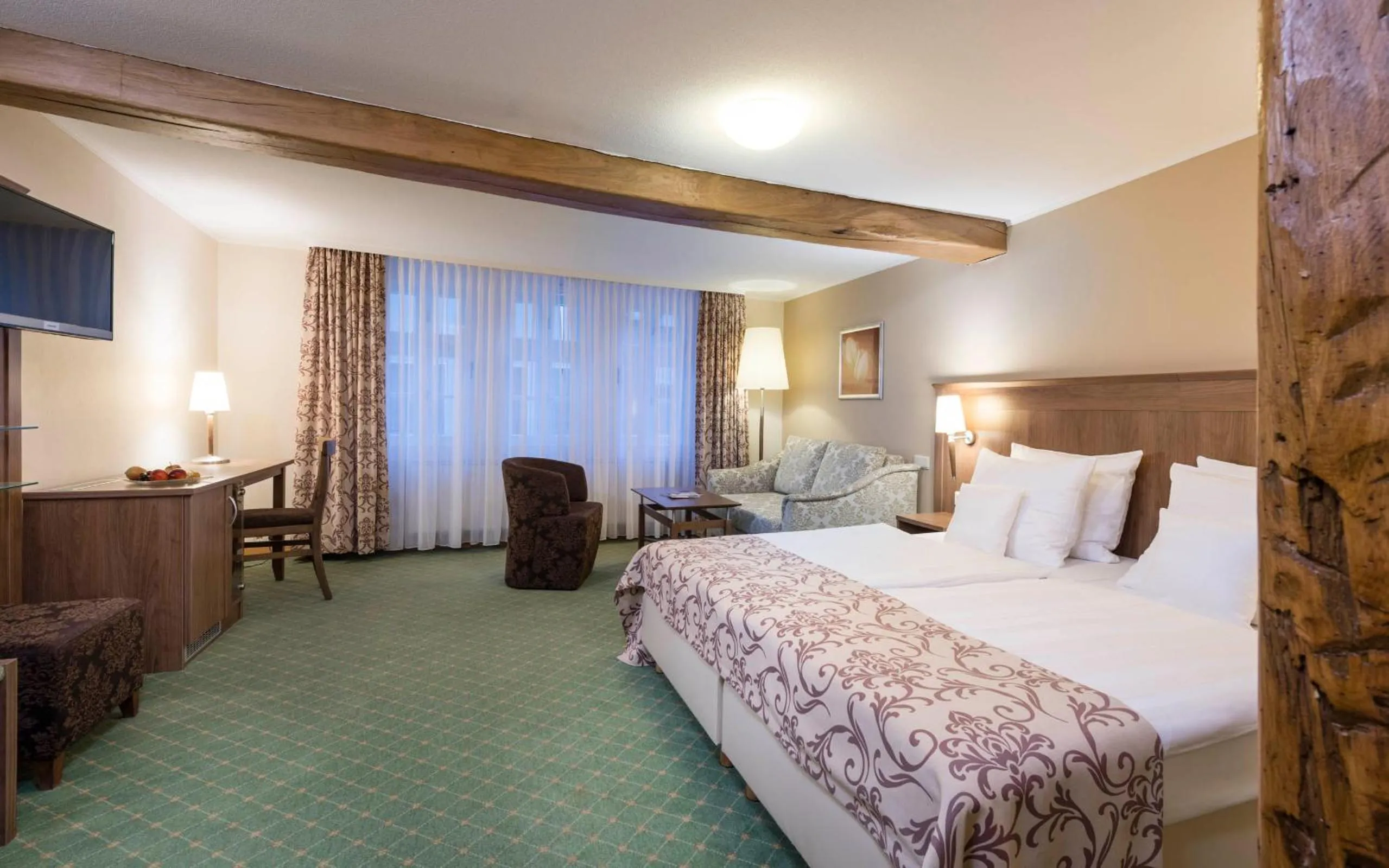 Photo of the whole room, Bed in derSTERN Hersfeld