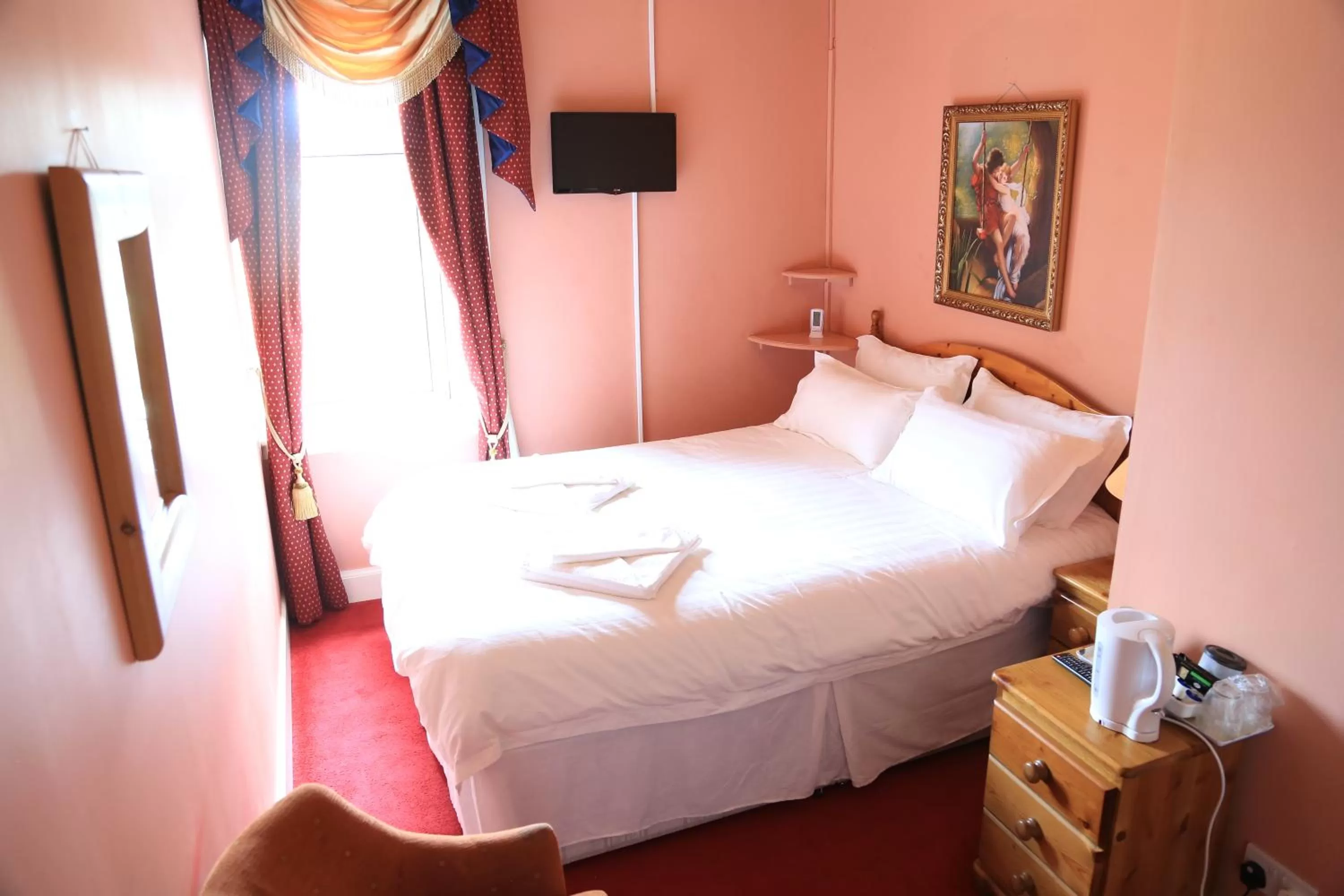 Decorative detail, Bed in Twin Lions Hotel