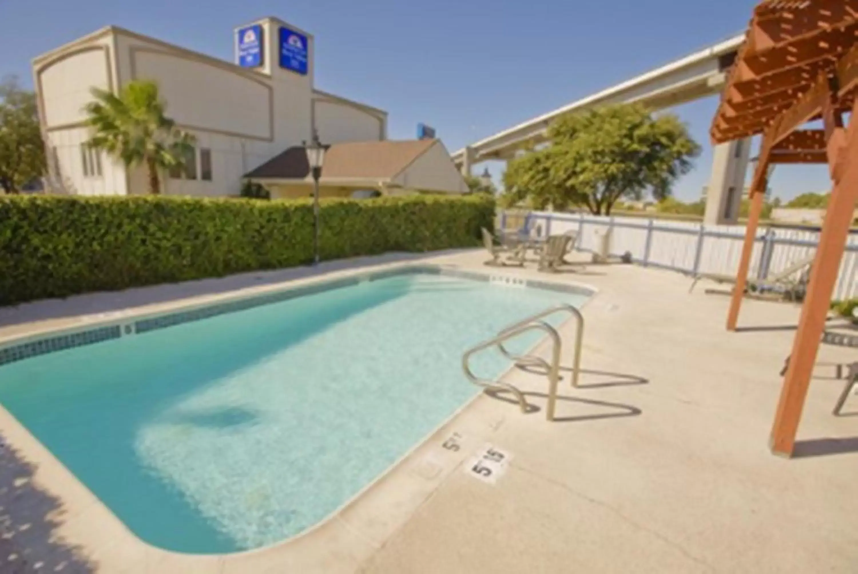 Pool view, Swimming Pool in Americas Best Value Inn Austin