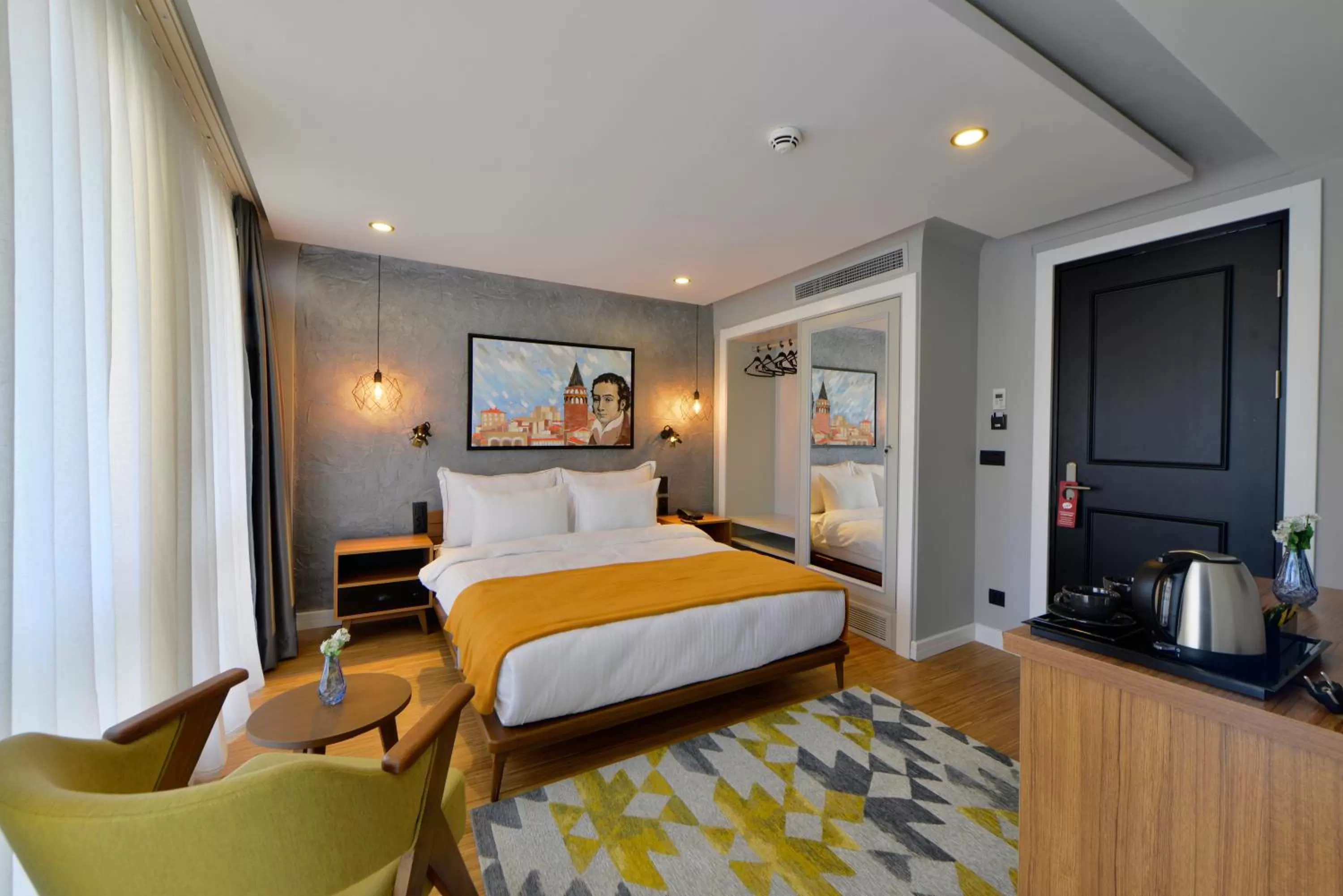 Photo of the whole room, Bed in Hotel Poem