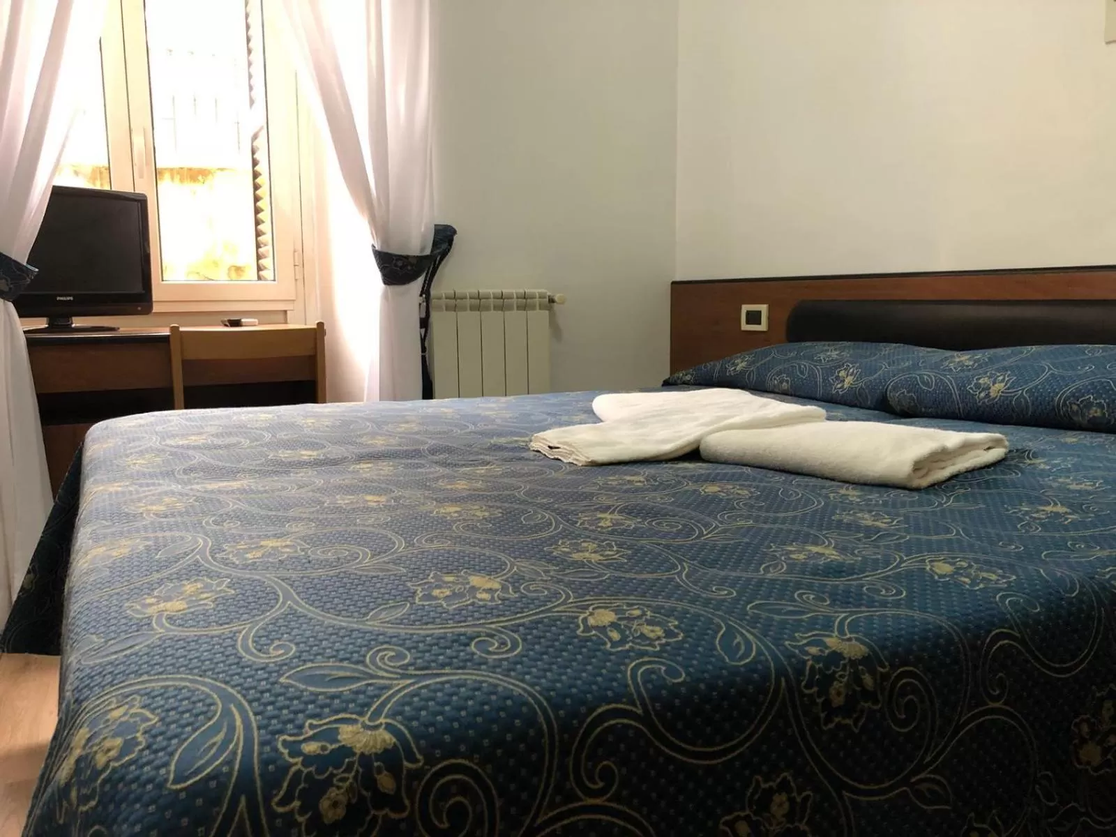 Quadruple Room with Private Bathroom in Hotel Positano