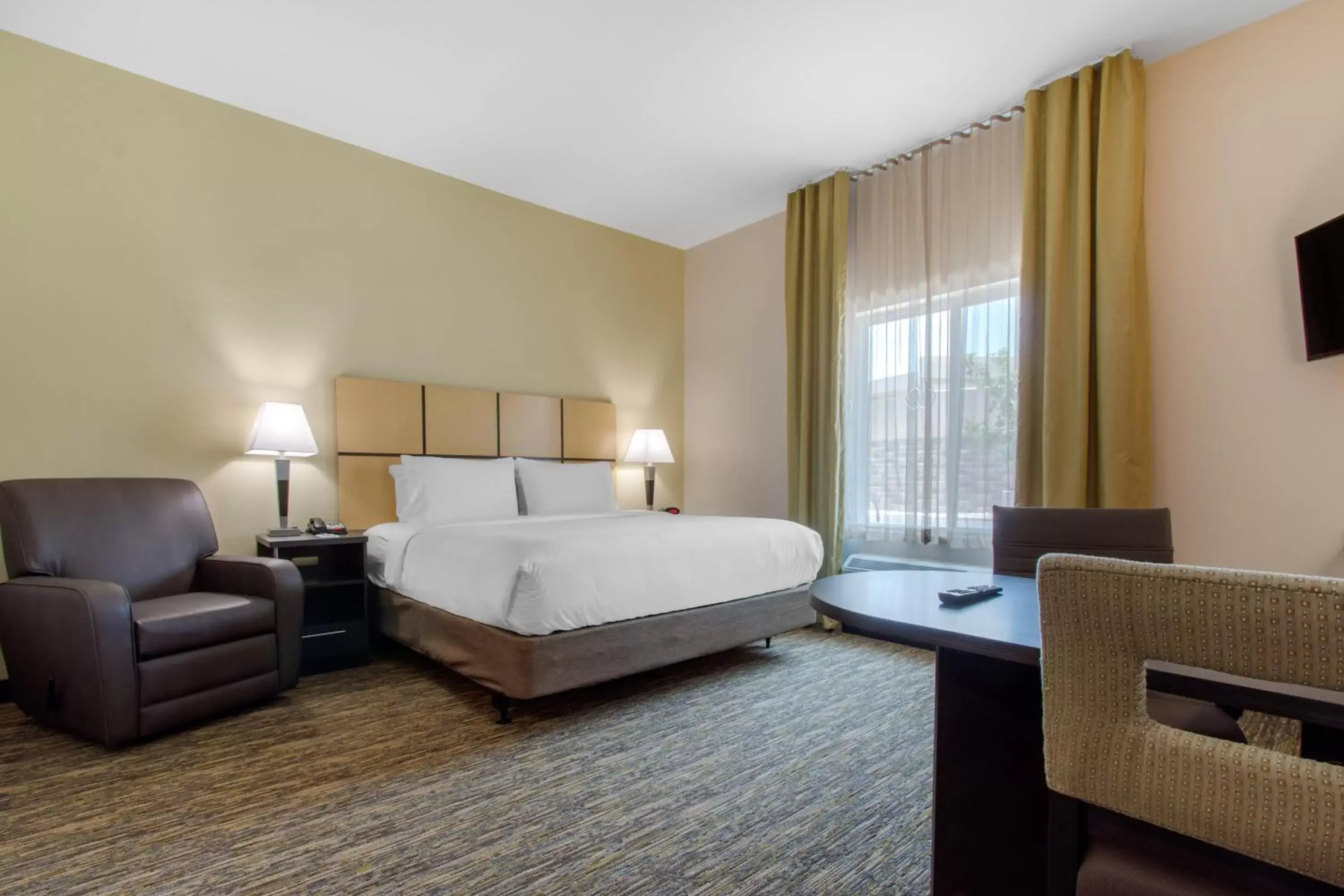 Photo of the whole room, Bed in Candlewood Suites - San Antonio Lackland AFB Area, an IHG Hotel