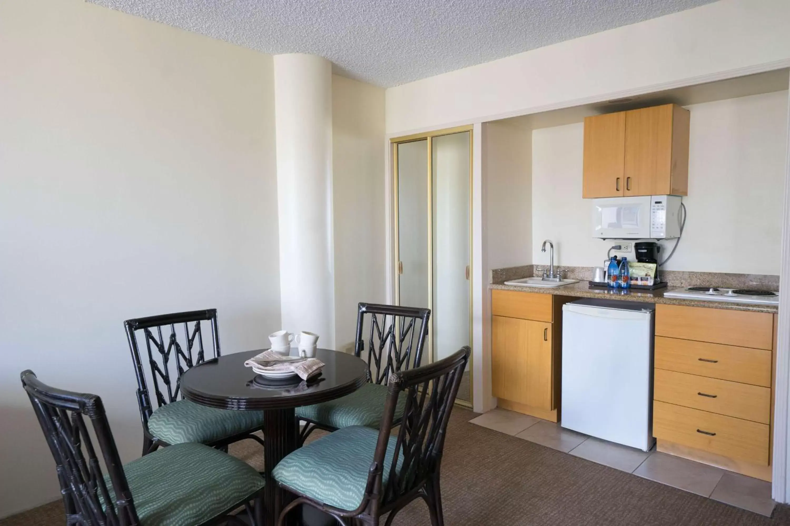 Kitchen or kitchenette, Dining Area in OHANA Waikiki East by OUTRIGGER