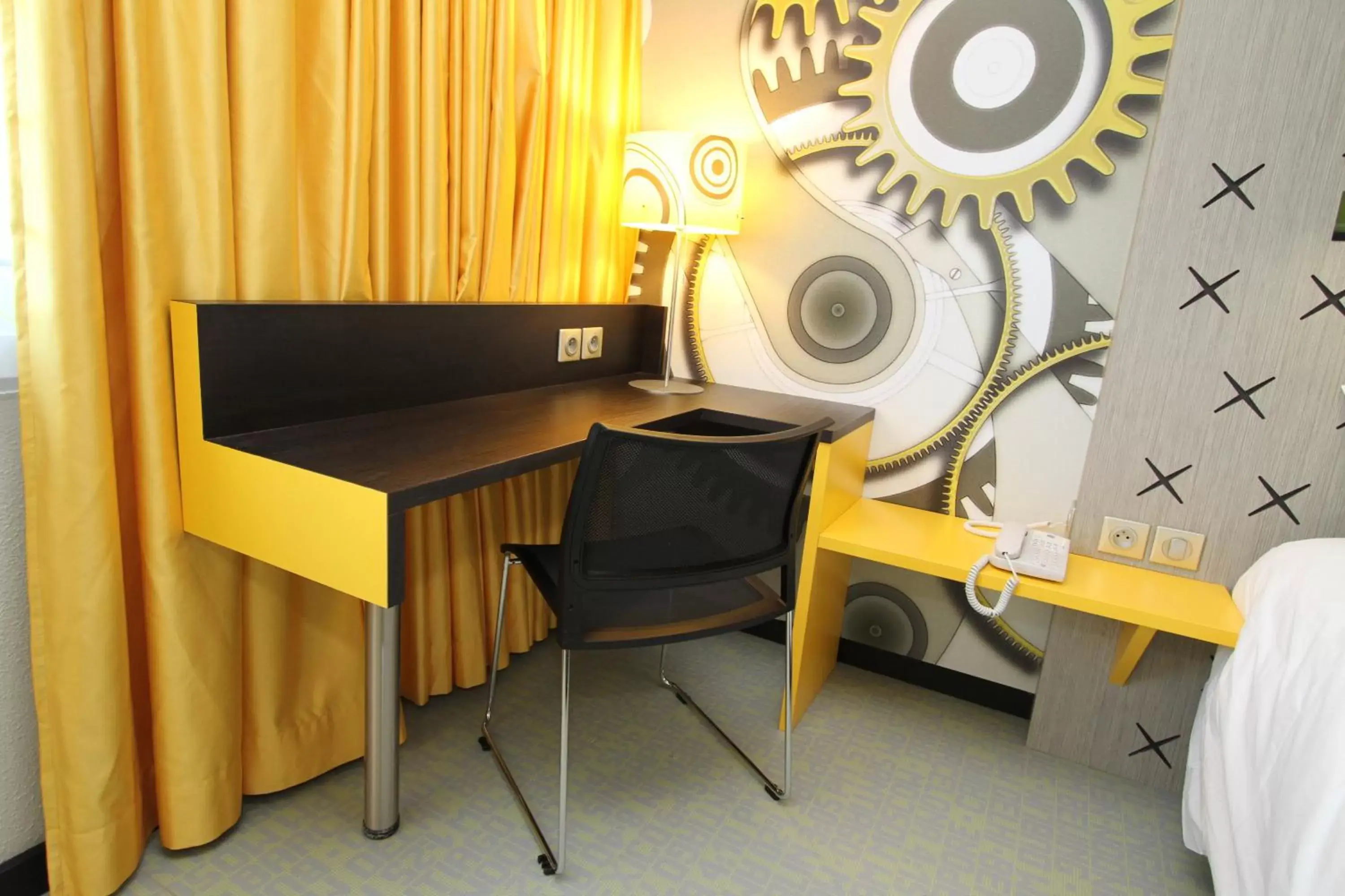 Seating area, TV/Entertainment Center in ibis Styles Besançon