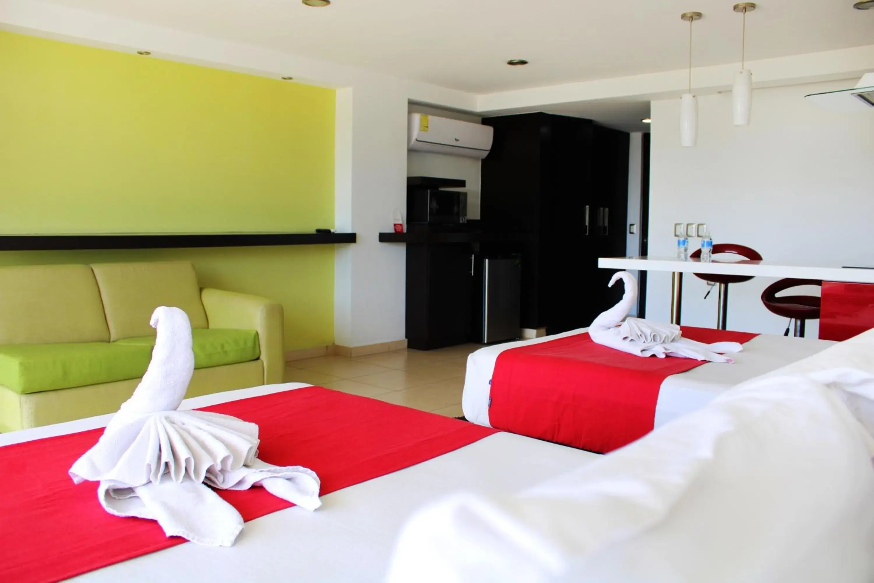 Photo of the whole room, Bed in Ramada by Wyndham Acapulco Hotel & Suites