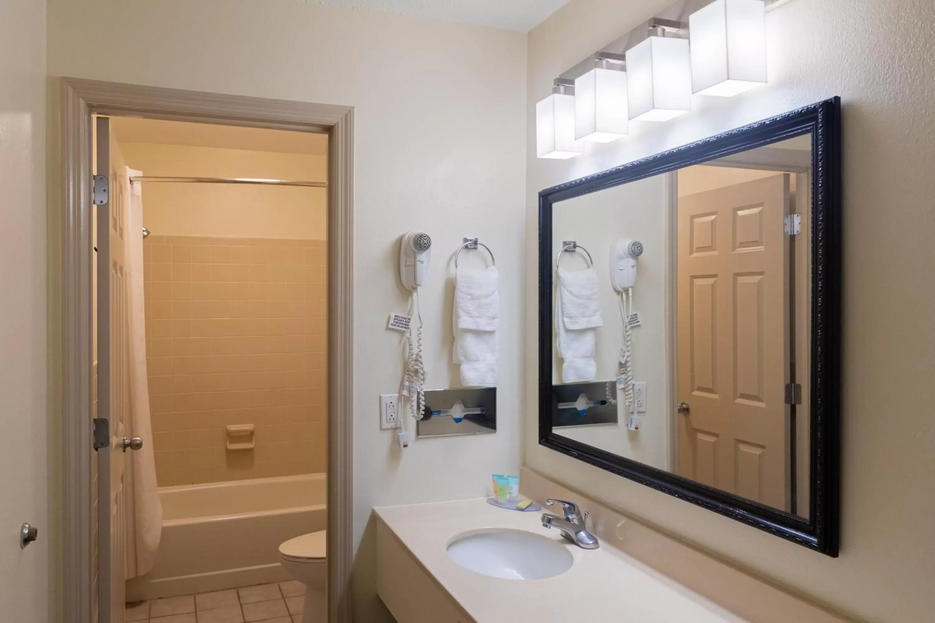 Bathroom in Cottonwood Suites Savannah Hotel & Conference Center