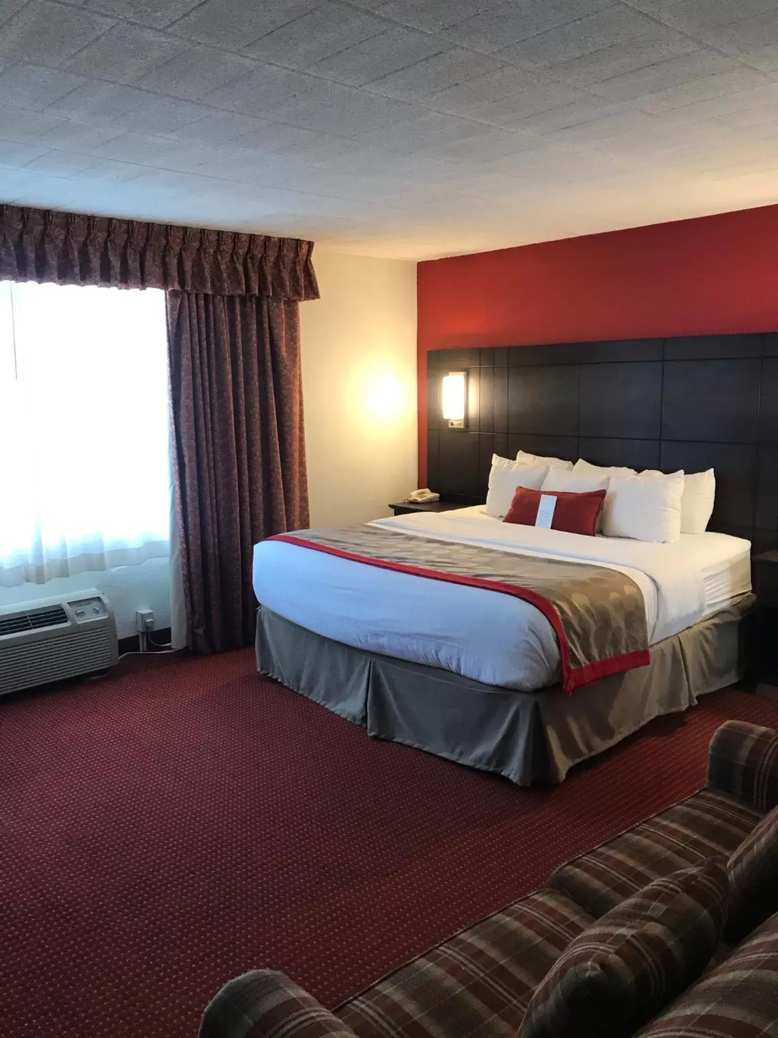 Bedroom, Bed in Ramada by Wyndham Ligonier