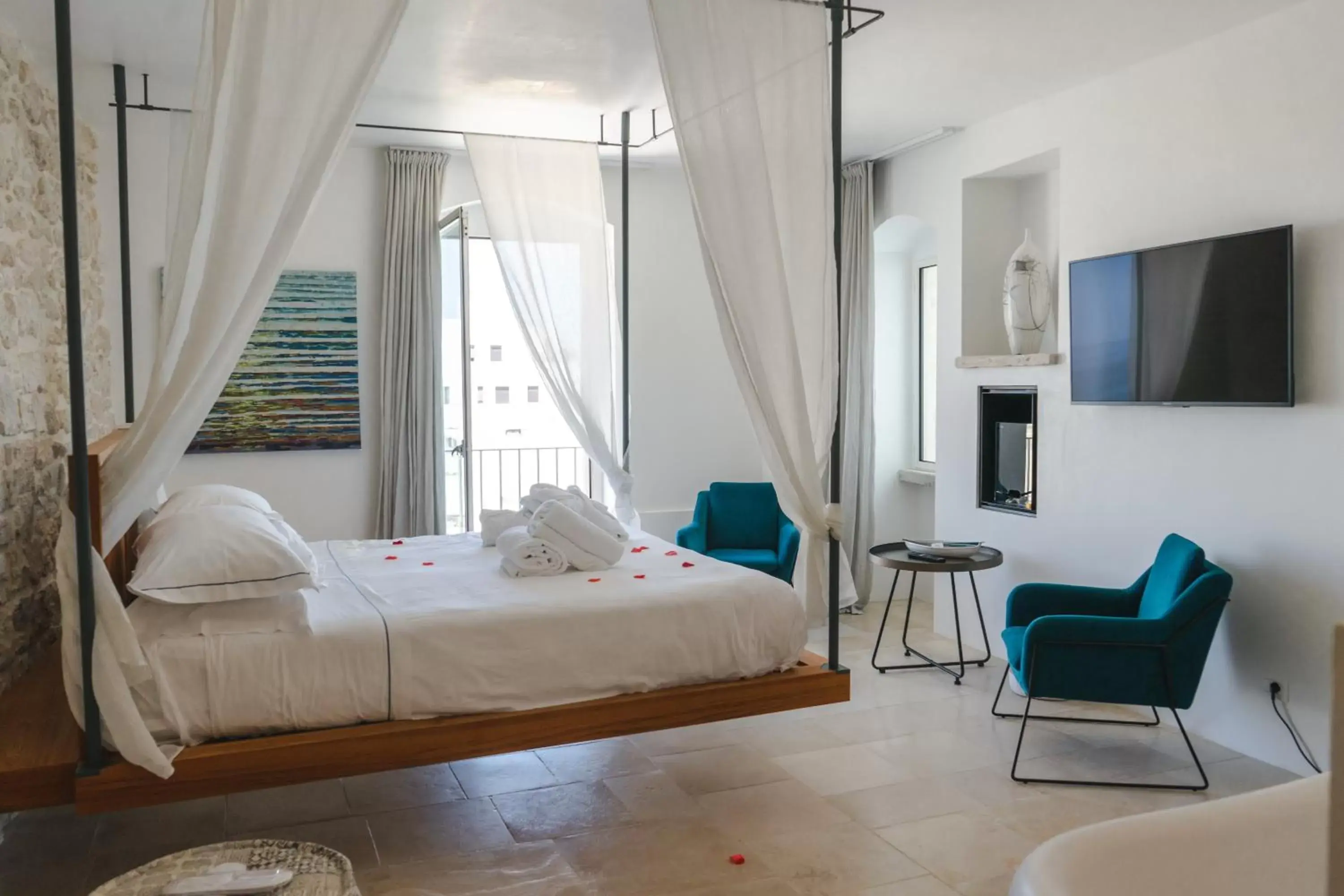 Bed in Antico Mondo Rooms & Suites