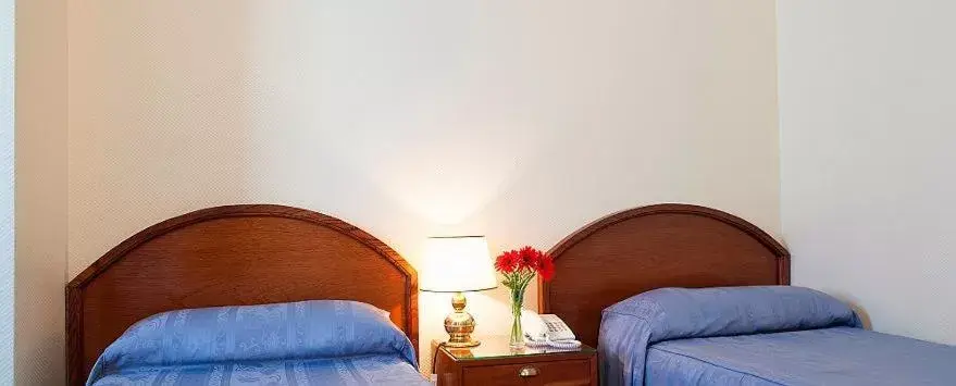 Bed, Seating Area in Hotel Centro Naval