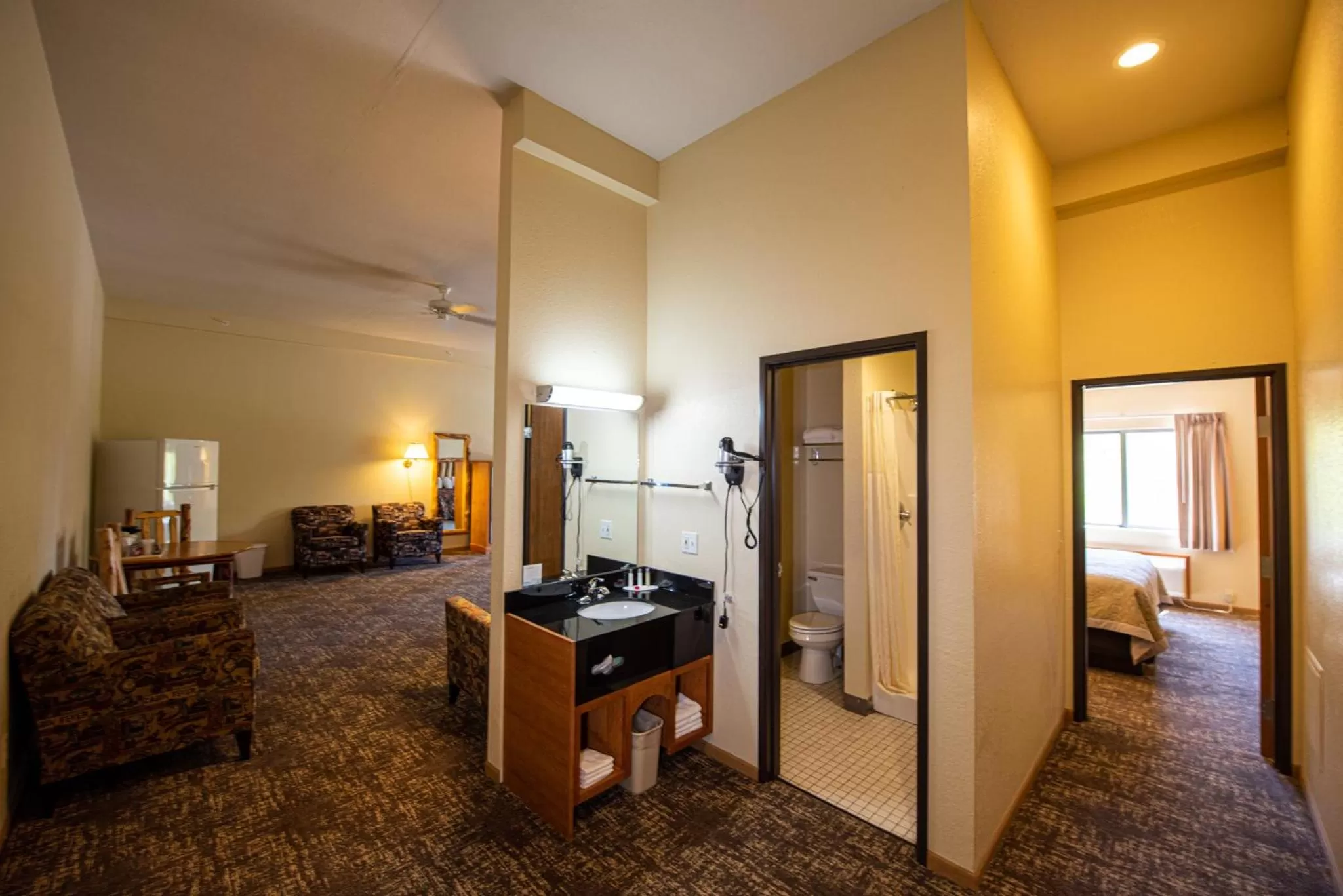 Bed in Super 8 by Wyndham Bridgeview of Mackinaw City