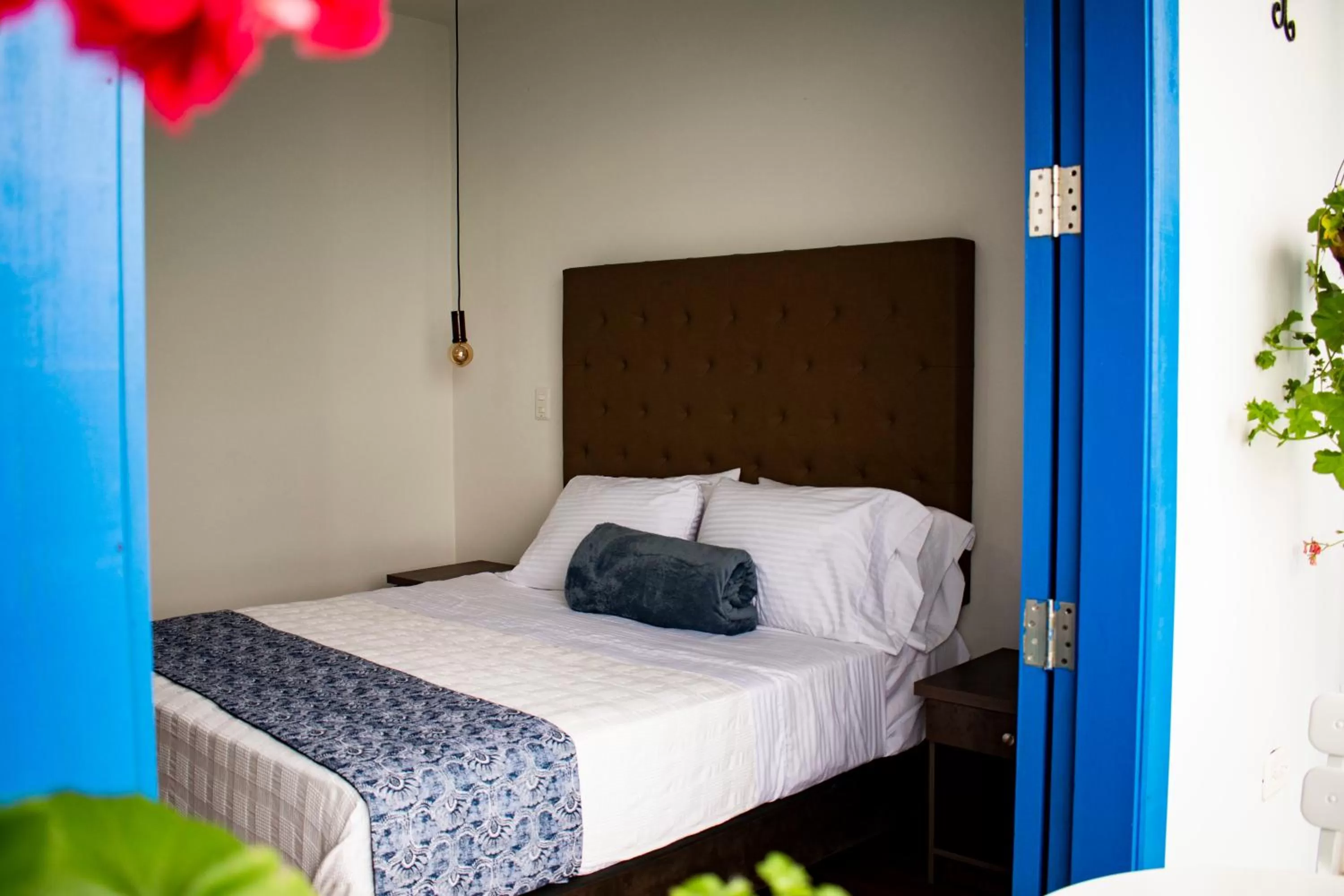 Bed in El Reloj Casa Hotel