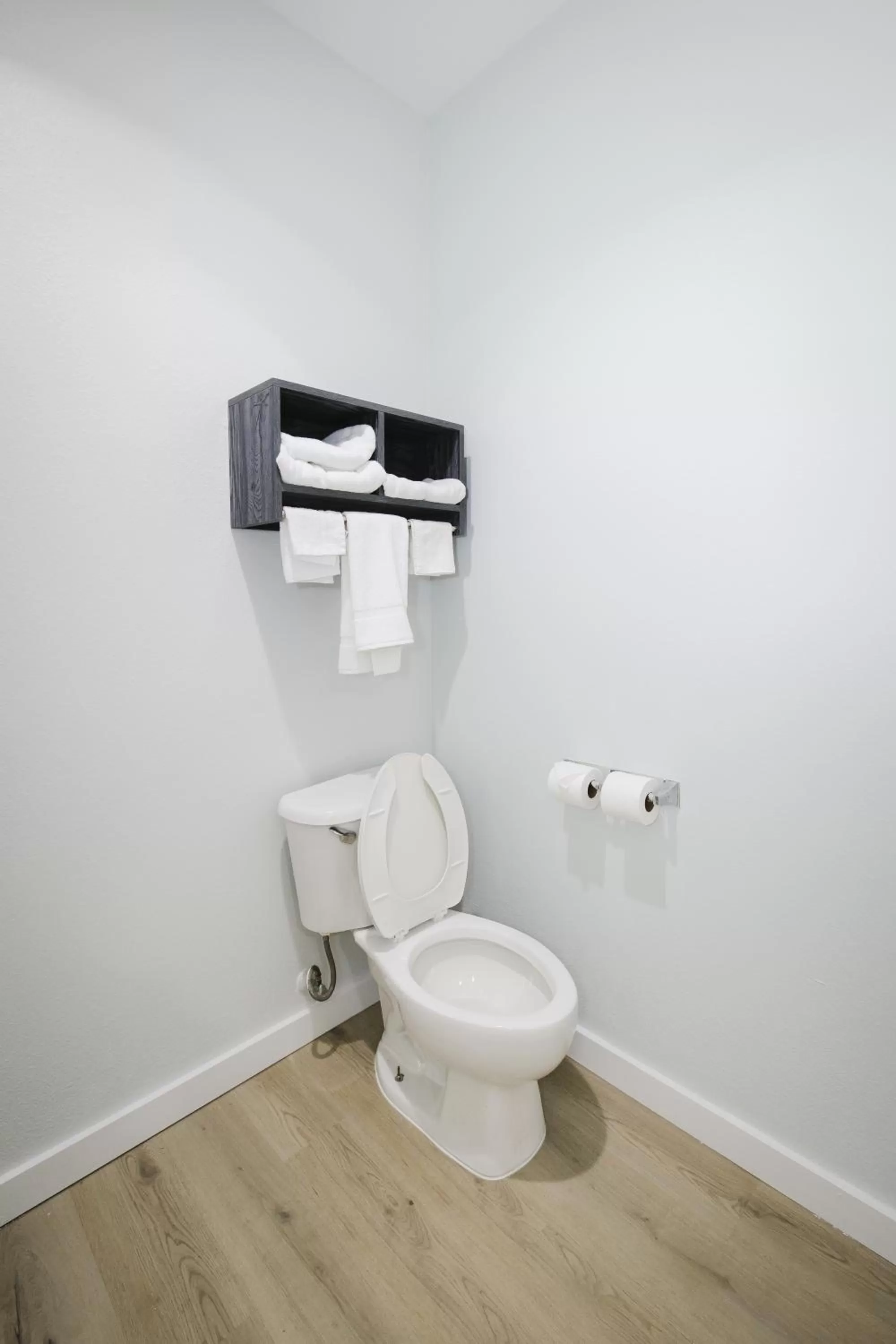 Toilet in Sapphire Inn & Suites