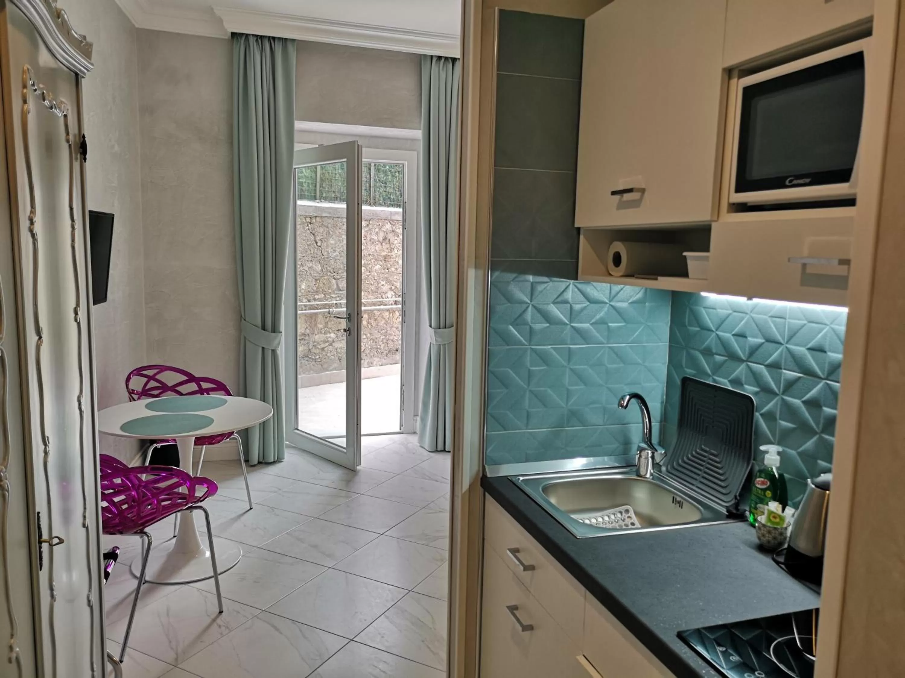 Kitchen or kitchenette in Altavilla Boutique Hotel