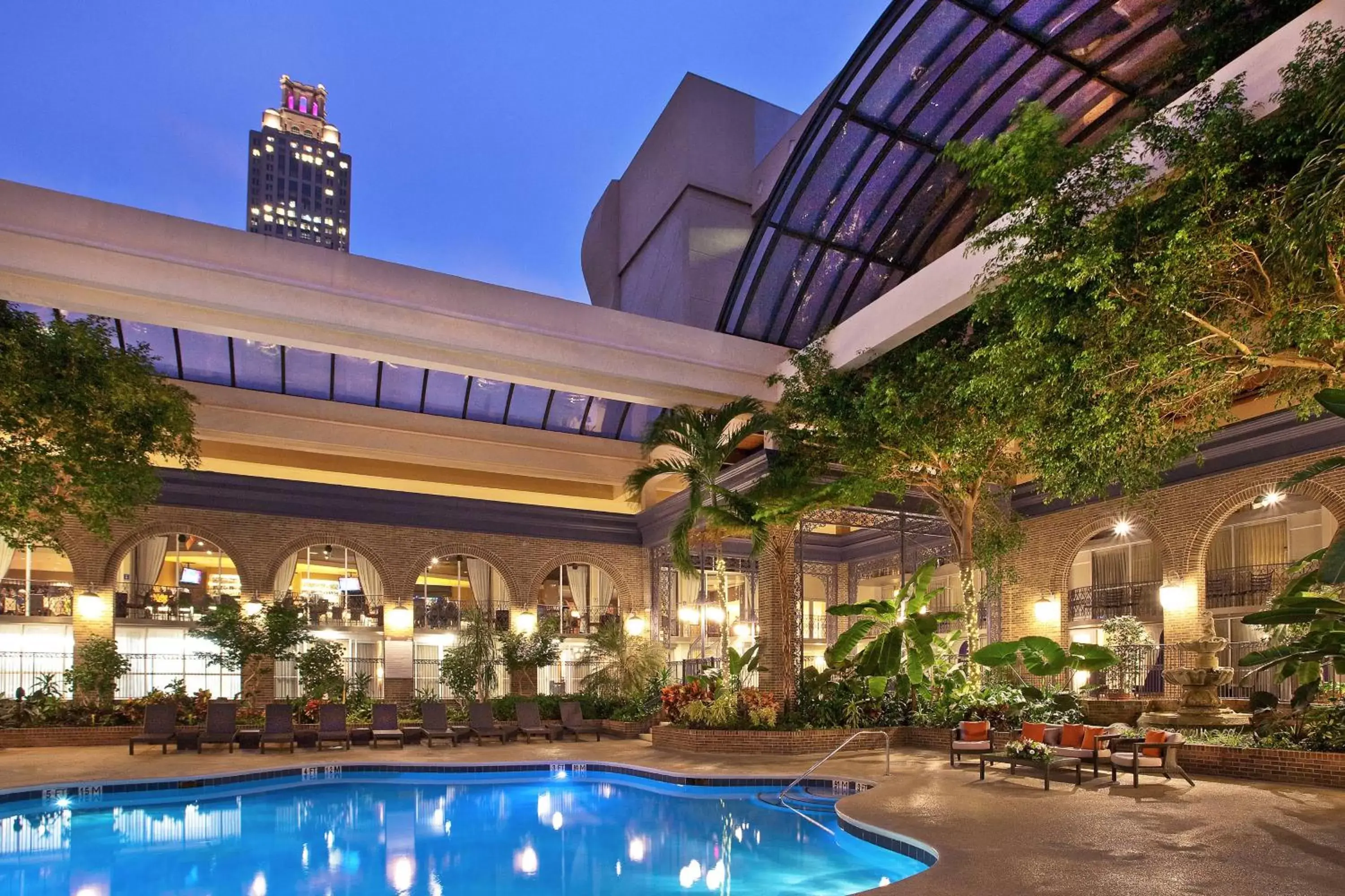 Swimming pool, Property Building in Courtland Grand Hotel, Trademark Collection by Wyndham