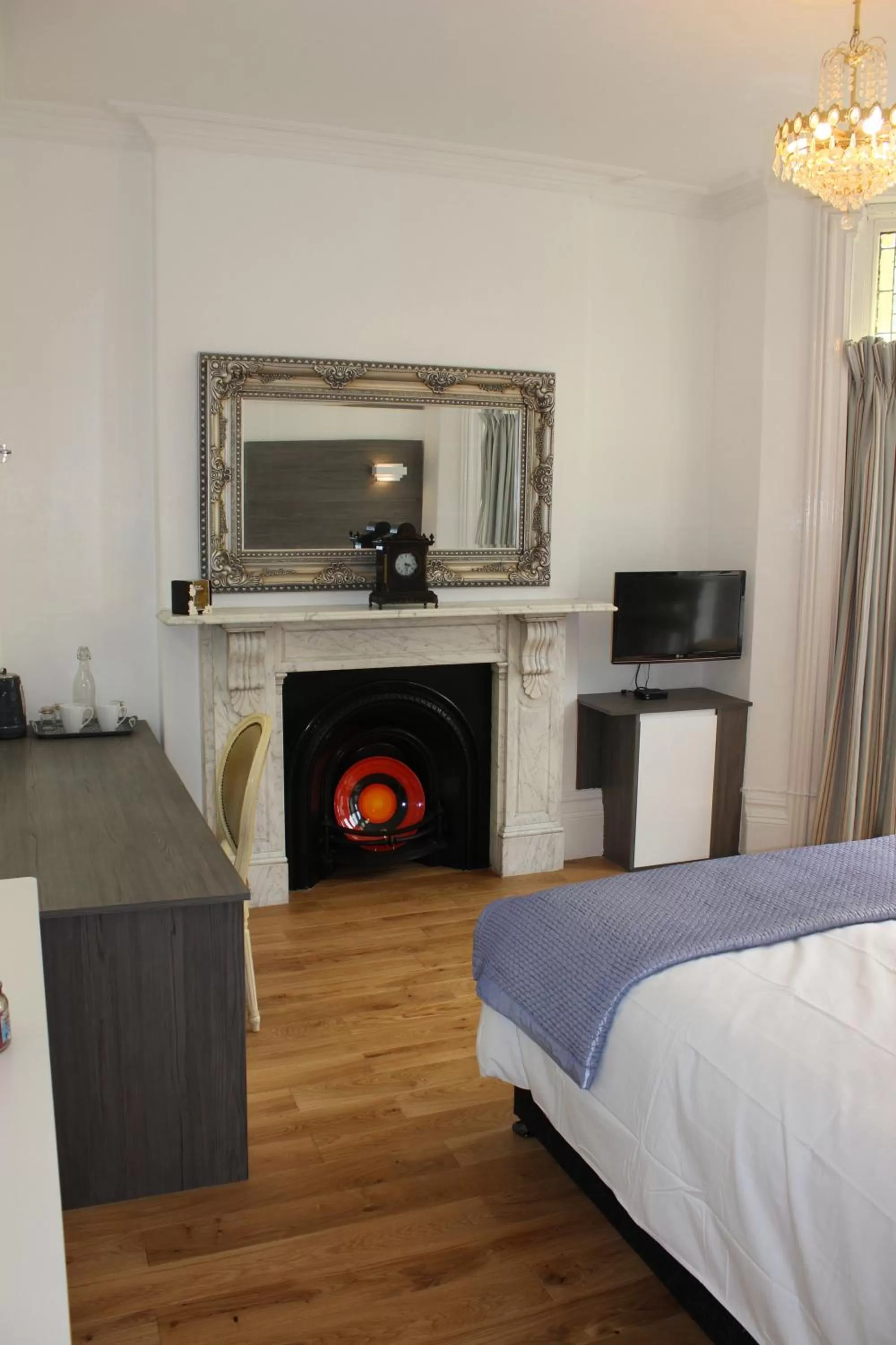 Bedroom, TV/Entertainment Center in Grosvenor House