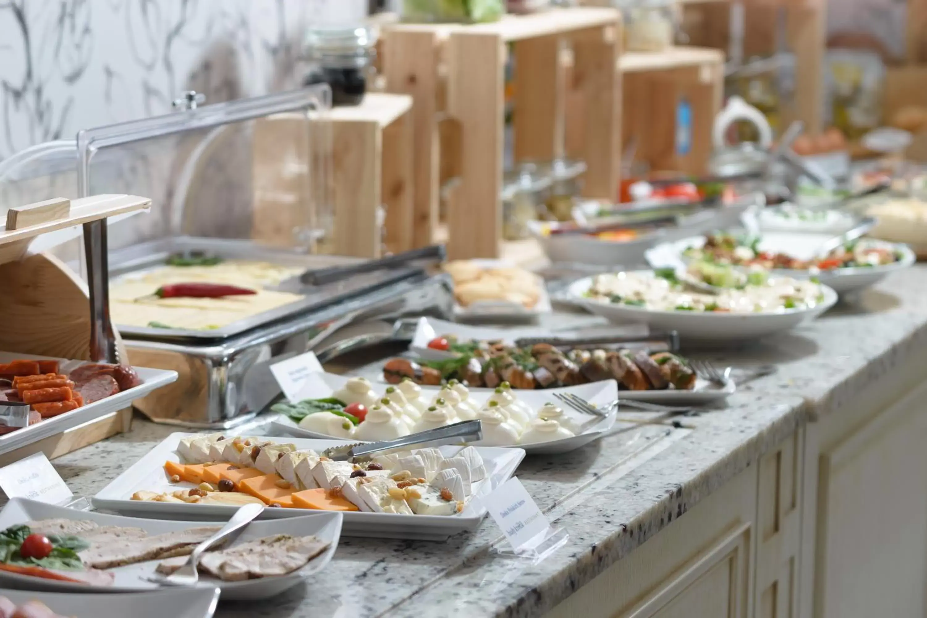 Buffet breakfast in Relais & Châteaux Hotel Quadrille - Adults Only Buffet breakfast in Relais & Châteaux Hotel Quadrille - Adults Only