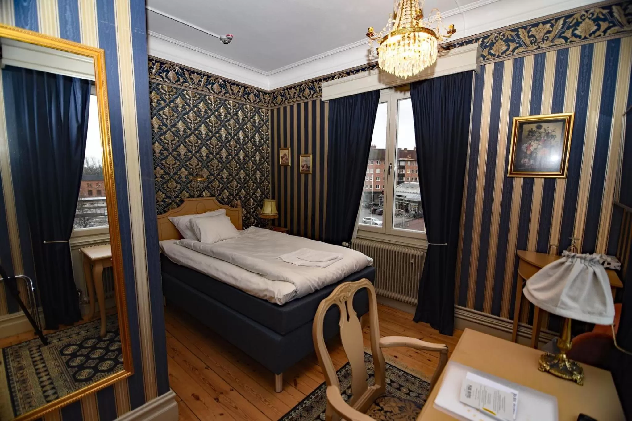 Photo of the whole room, Bed in Park Hotel Linköping Fawlty Towers