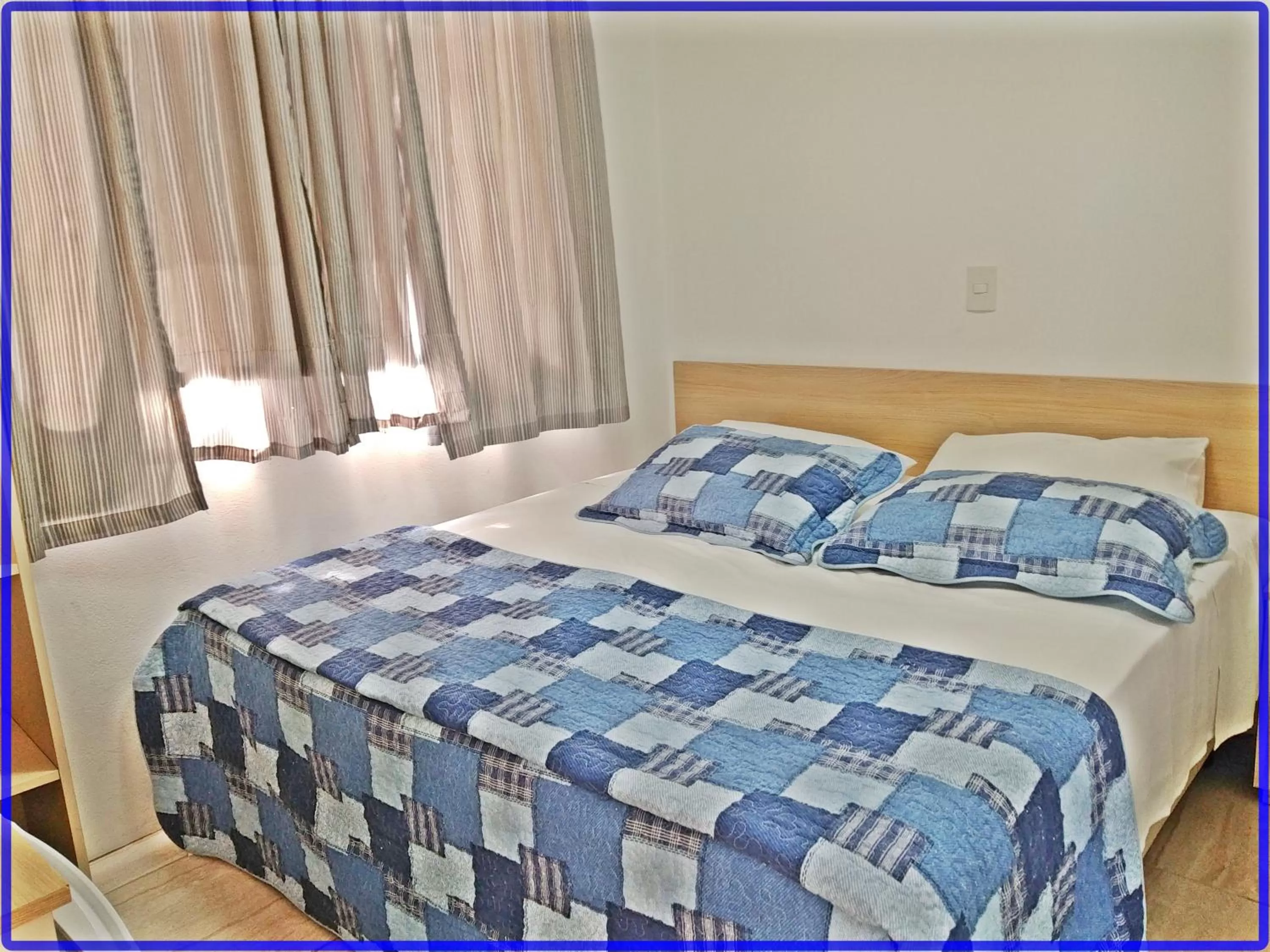 Bed in Hotel Anjos LTDA