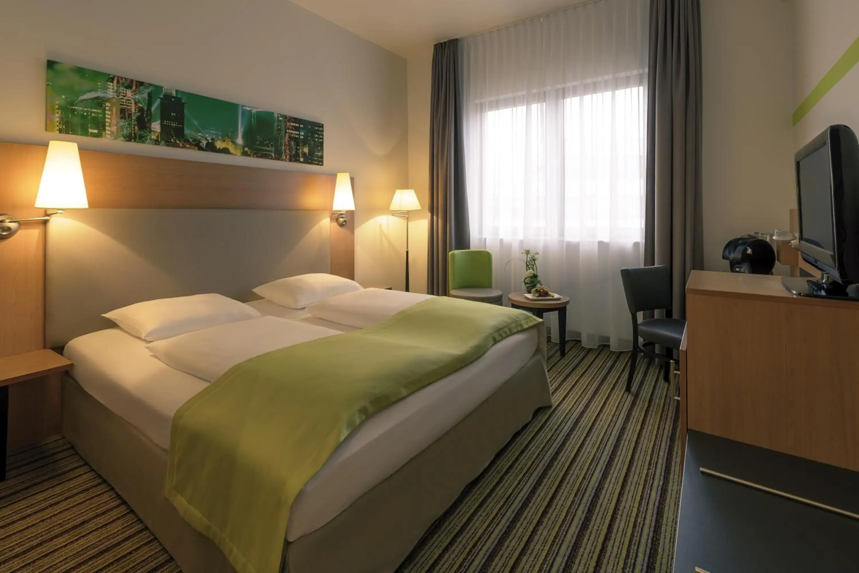 Photo of the whole room, Bed in Mercure Hotel Frankfurt Eschborn Süd