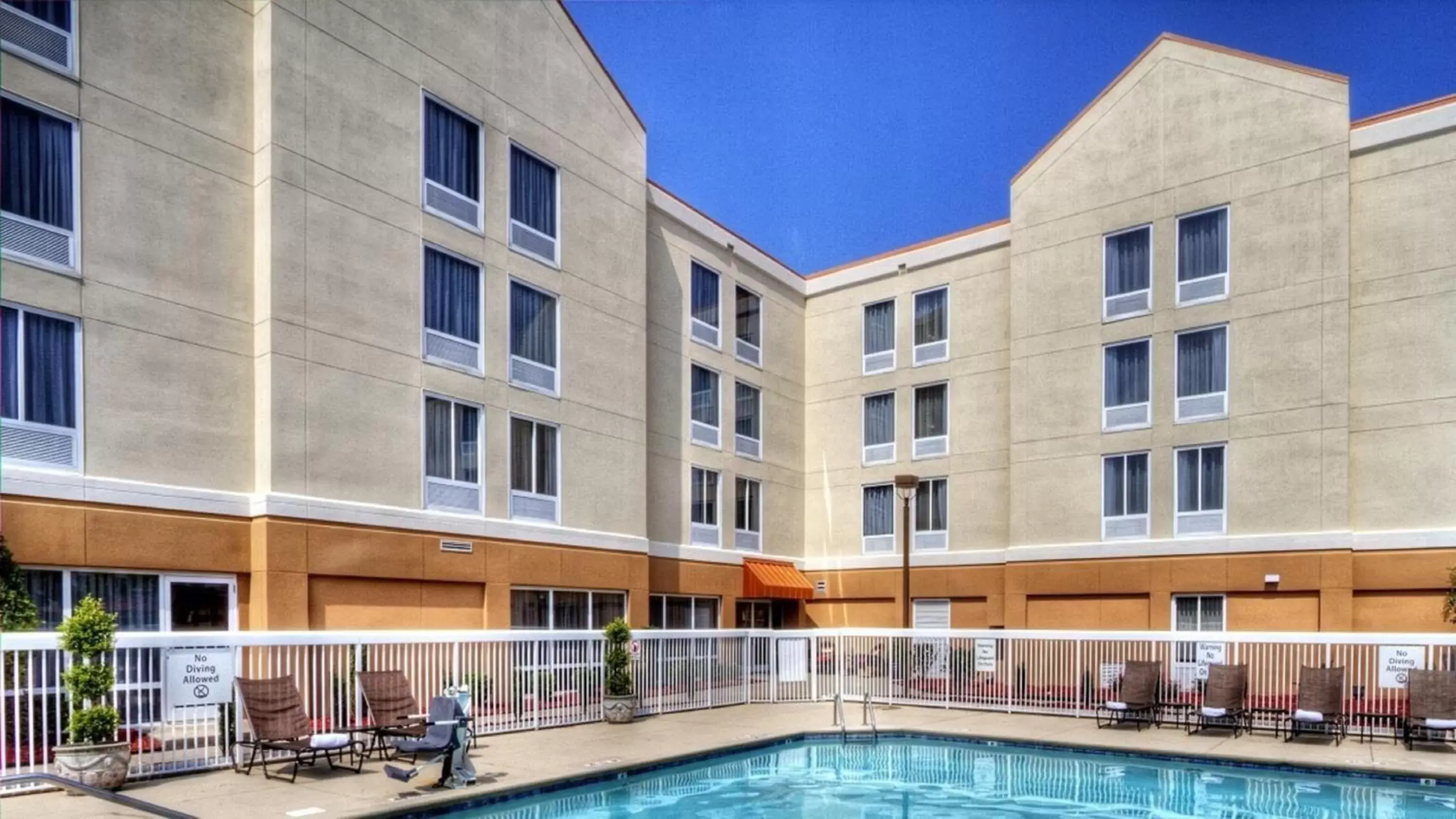 Swimming pool, Property Building in Holiday Inn Express Greenville, an IHG Hotel