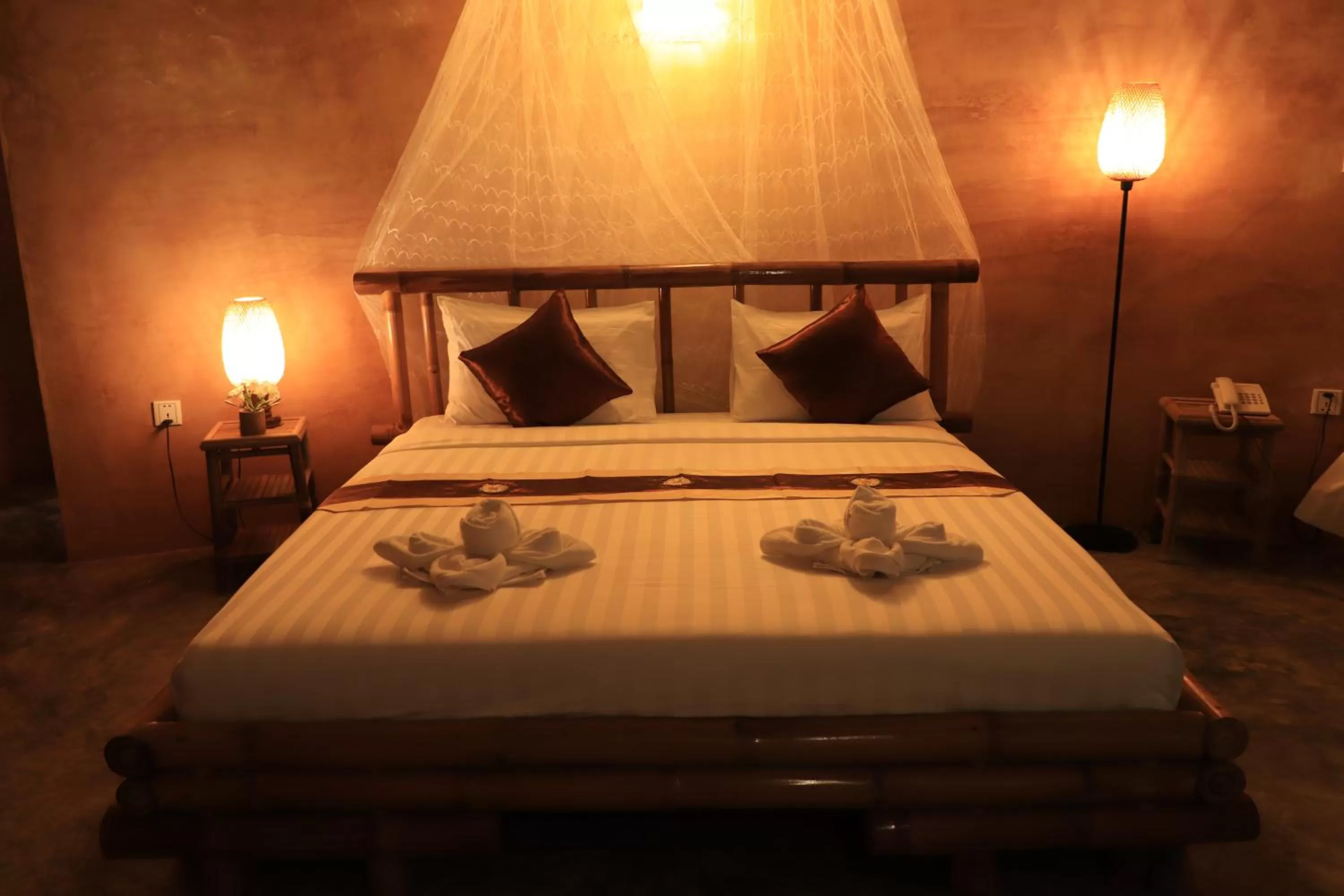 Bed in Hanchey Bamboo Resort