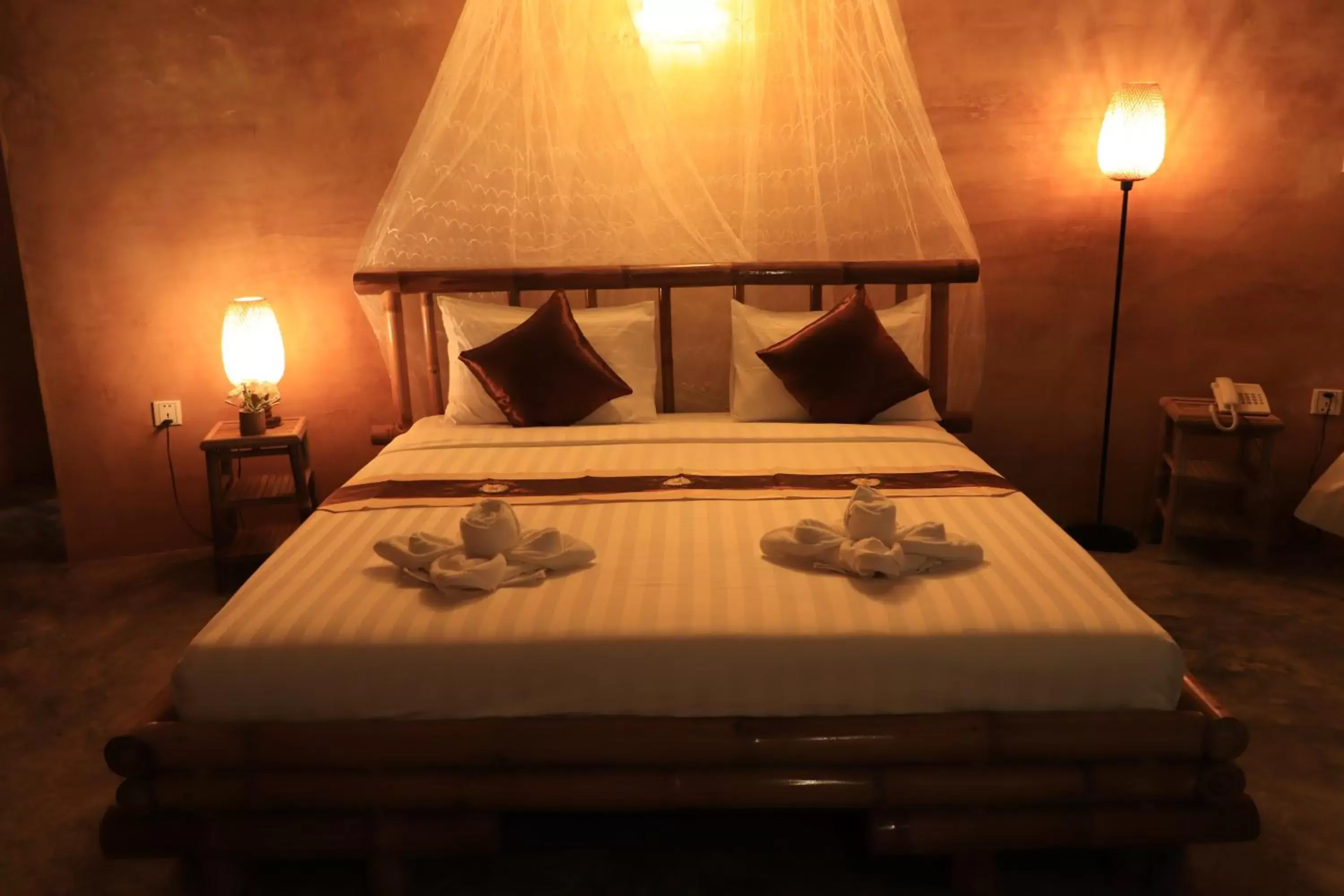 Bed in Hanchey Bamboo Resort Bed in Hanchey Bamboo Resort