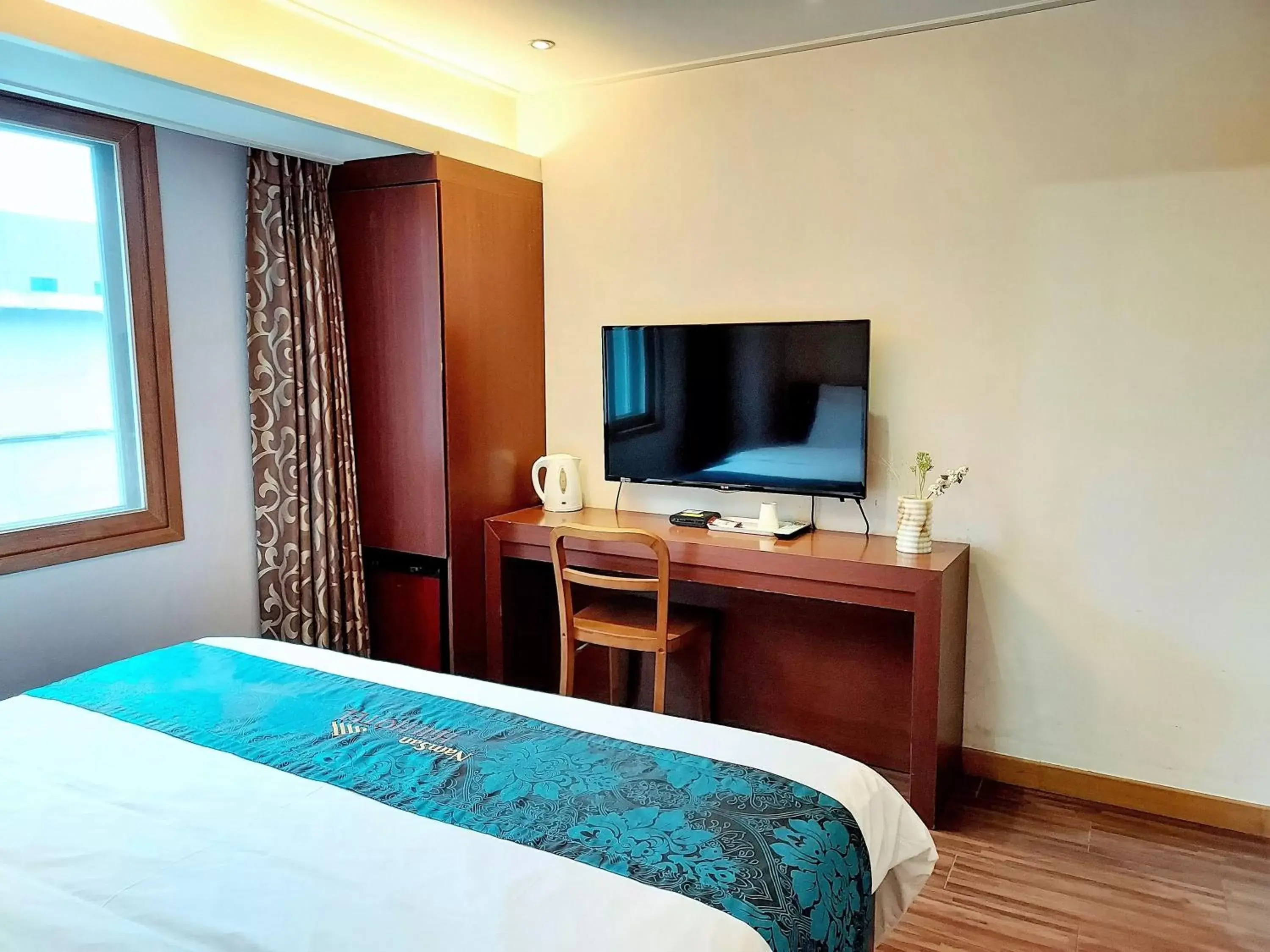 TV and multimedia, Bed in Namsan Hill Hotel