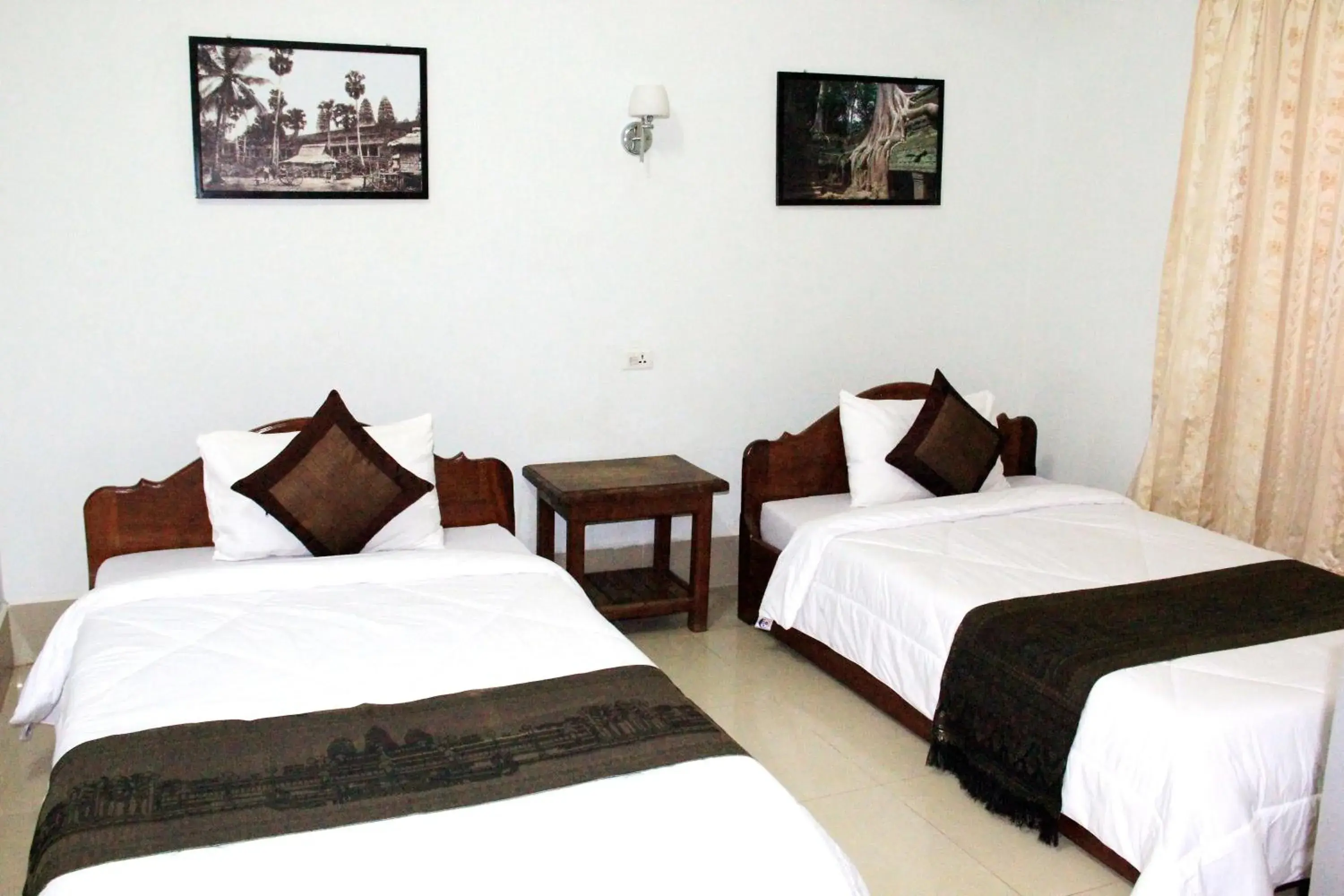 Photo of the whole room, Bed in Tropical Breeze Guesthouse