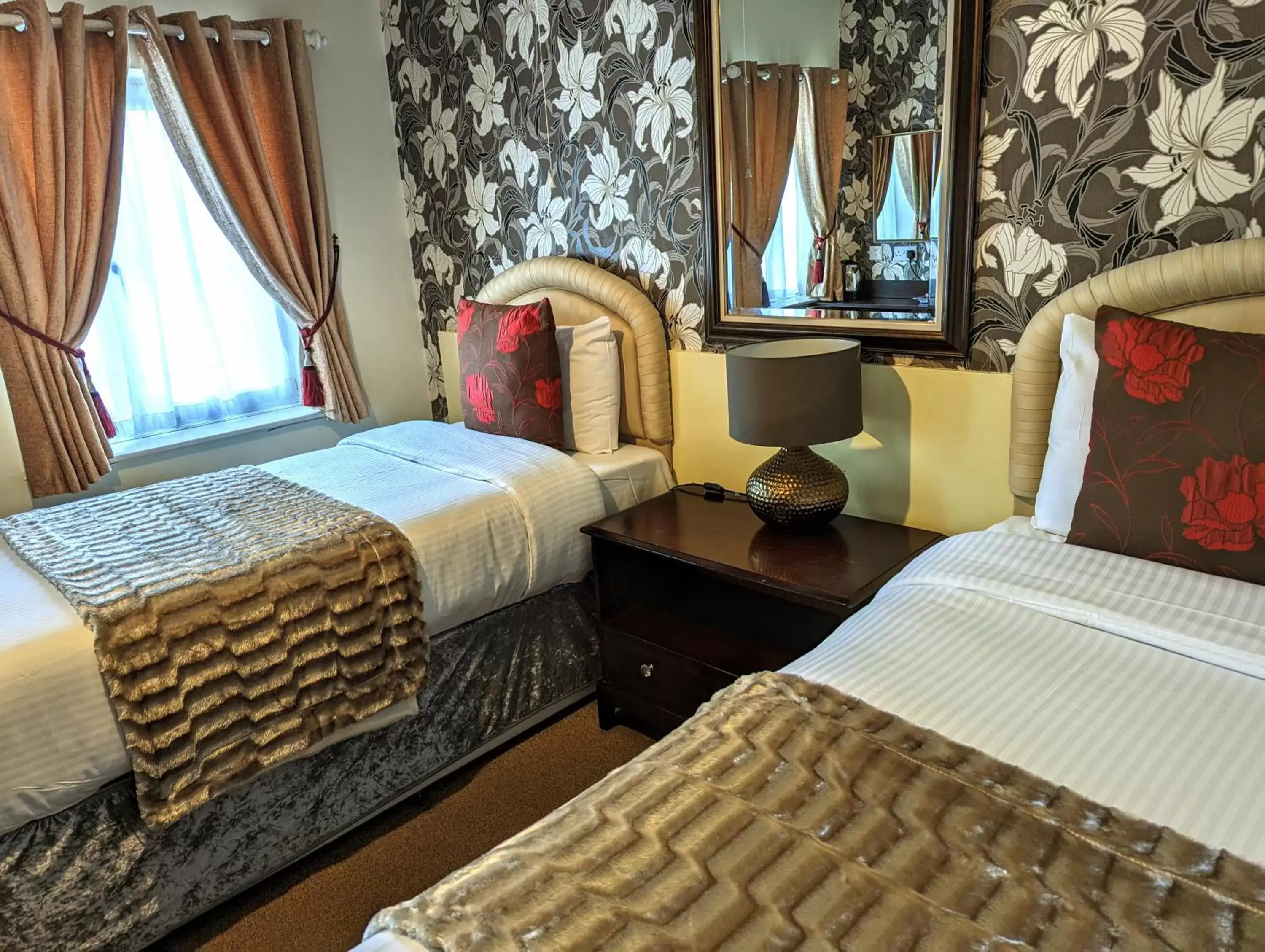 Bed in Brookside Hotel & Restaurant