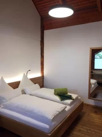 Bed in Naturata Hotel