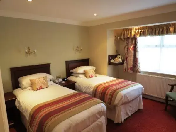 Bedroom, Bed in Consort Hotel