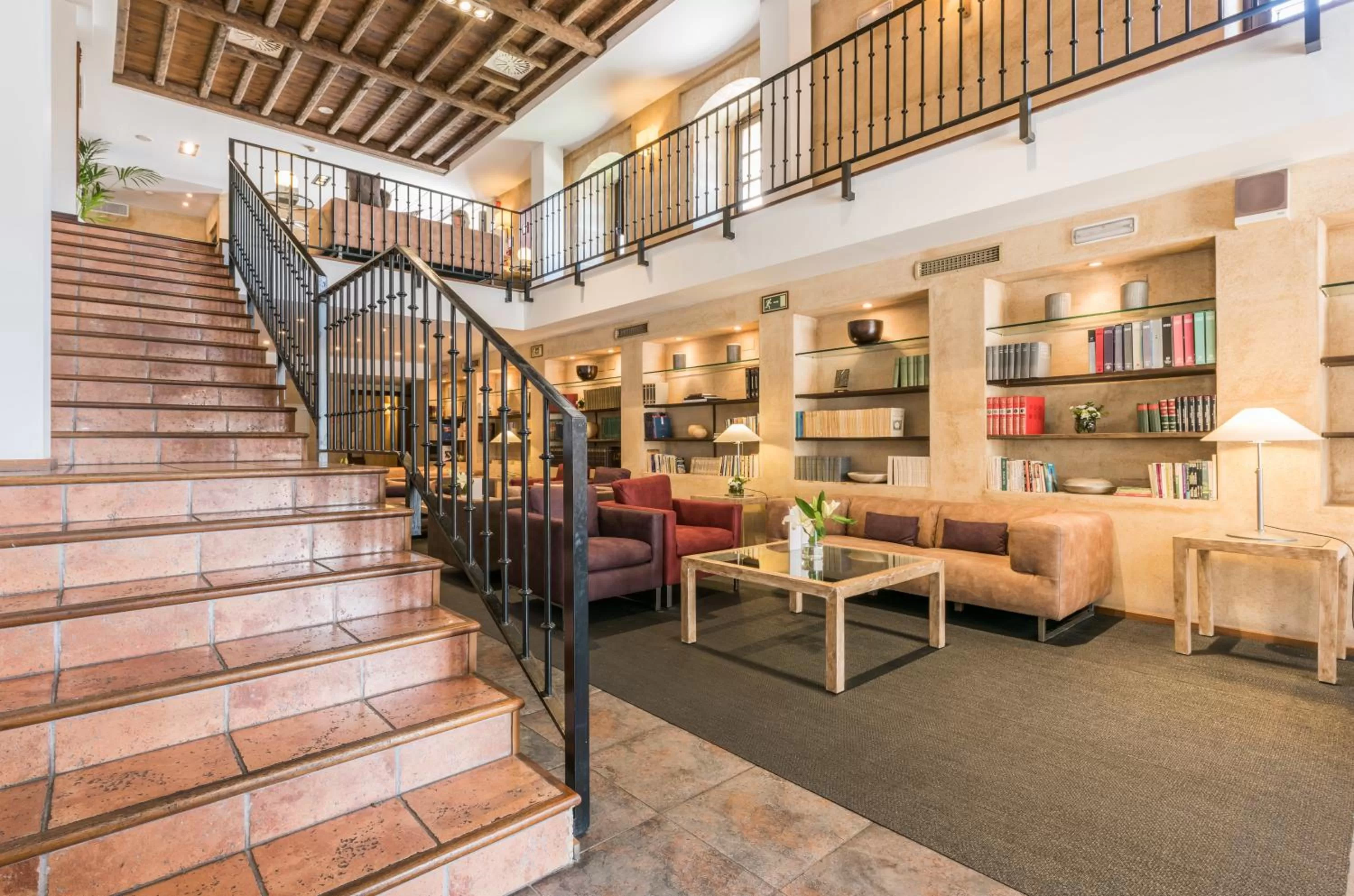 Communal lounge/ TV room in Hospes Palacio de San Esteban, a Member of Design Hotels
