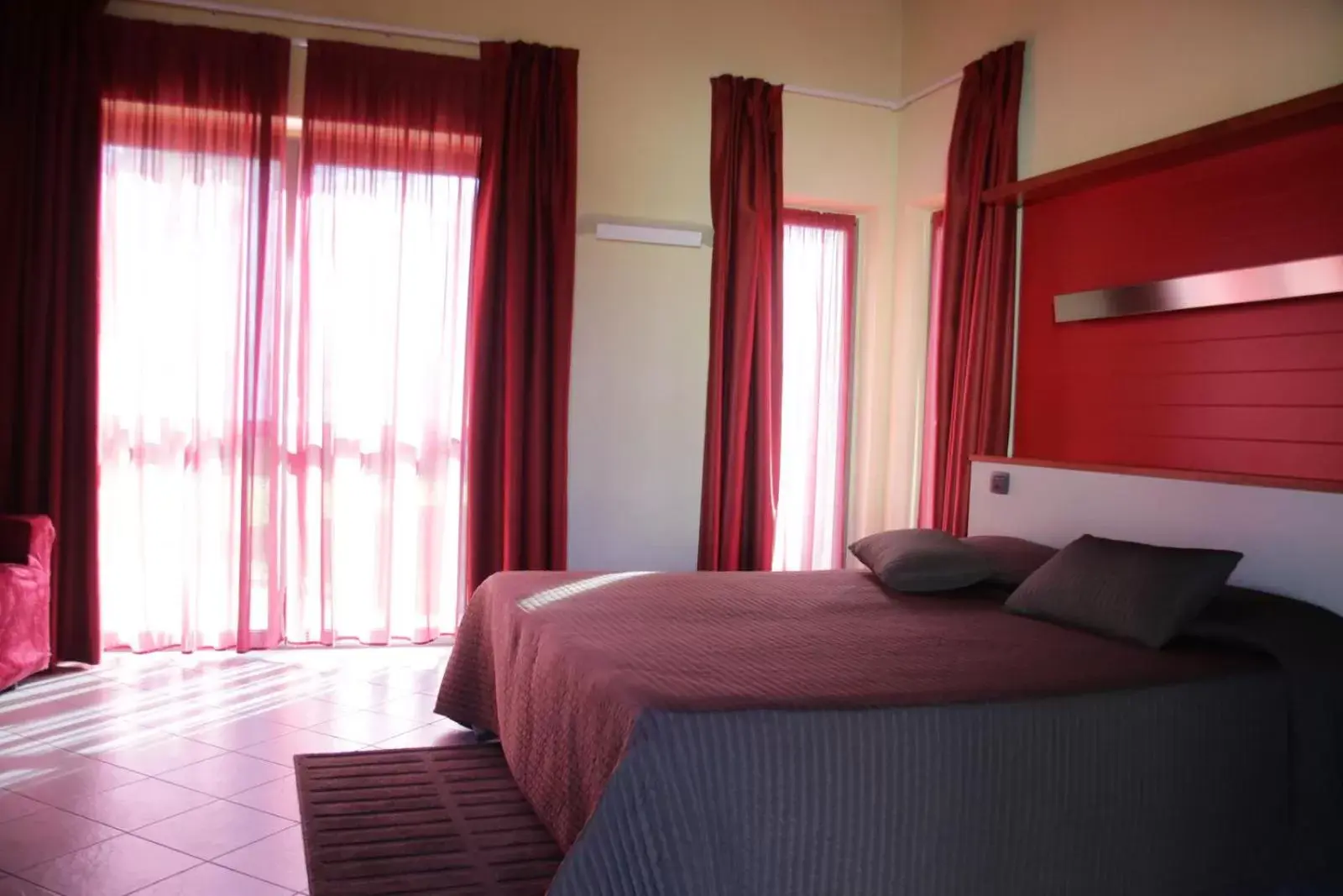 Bed in AgriCamping AlbaVillage Hotel & Wellness