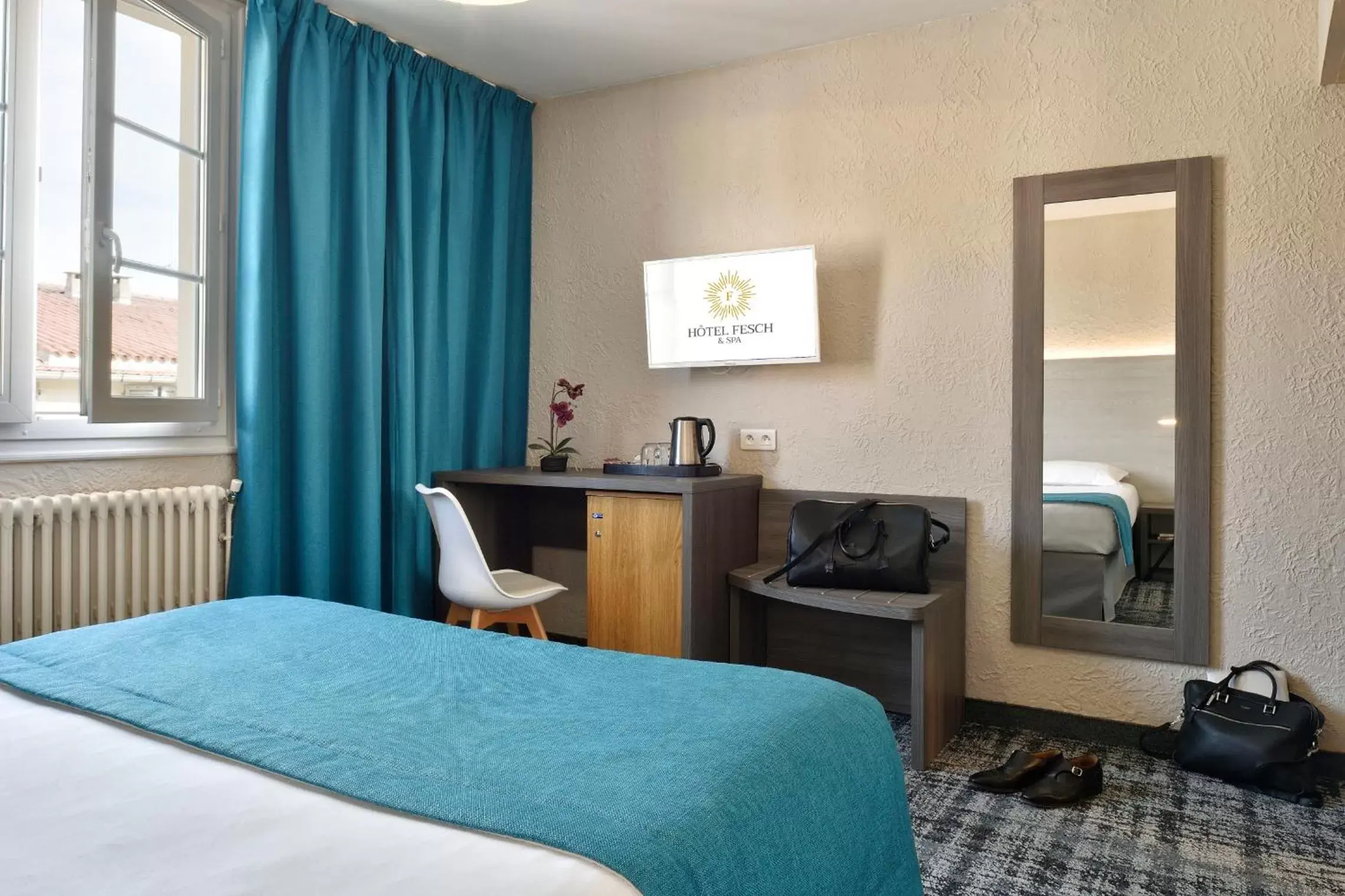 Photo of the whole room, Bed in Hôtel Fesch & Spa Photo of the whole room, Bed in Hôtel Fesch & Spa