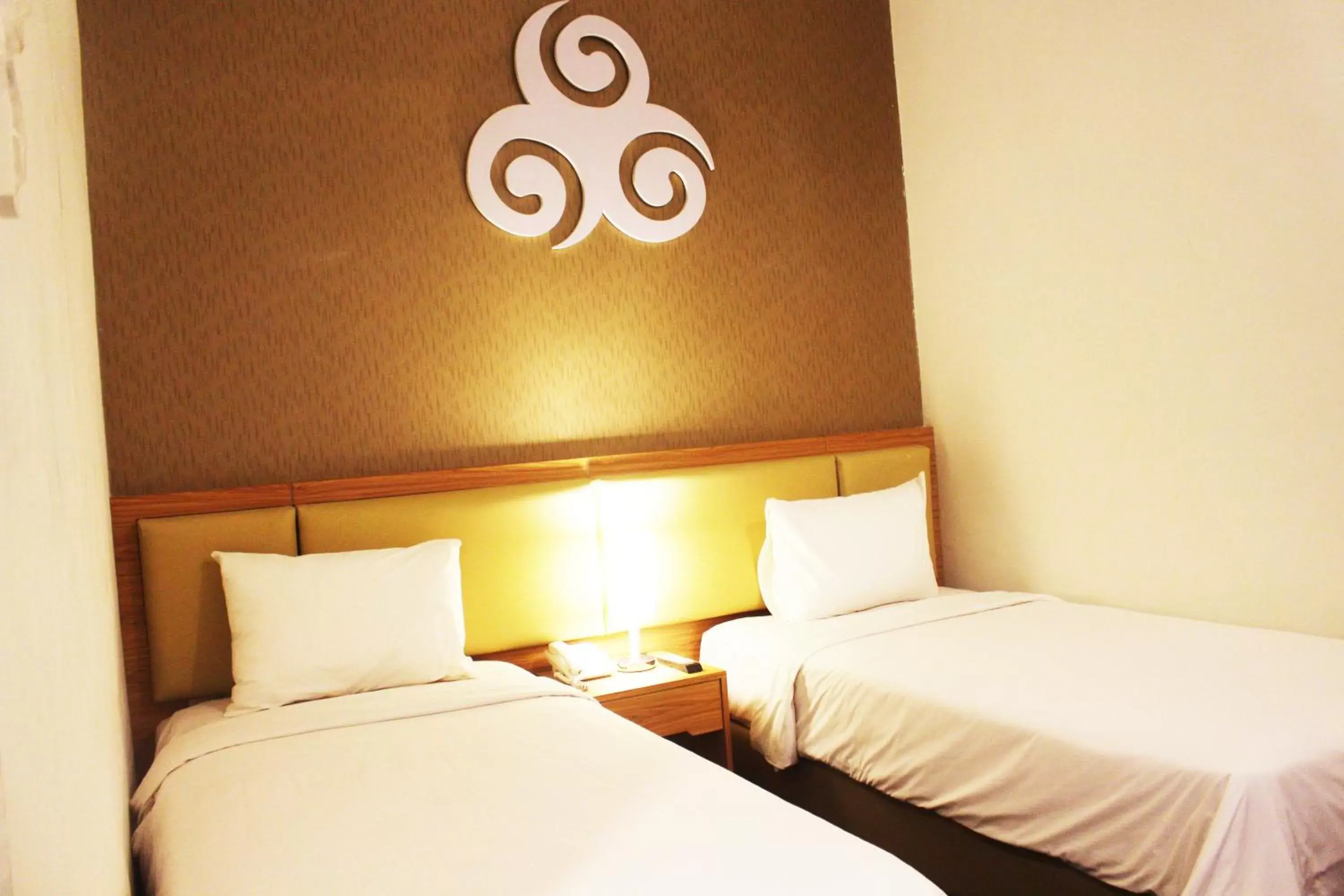 Bed in Tjokro Hotel Klaten